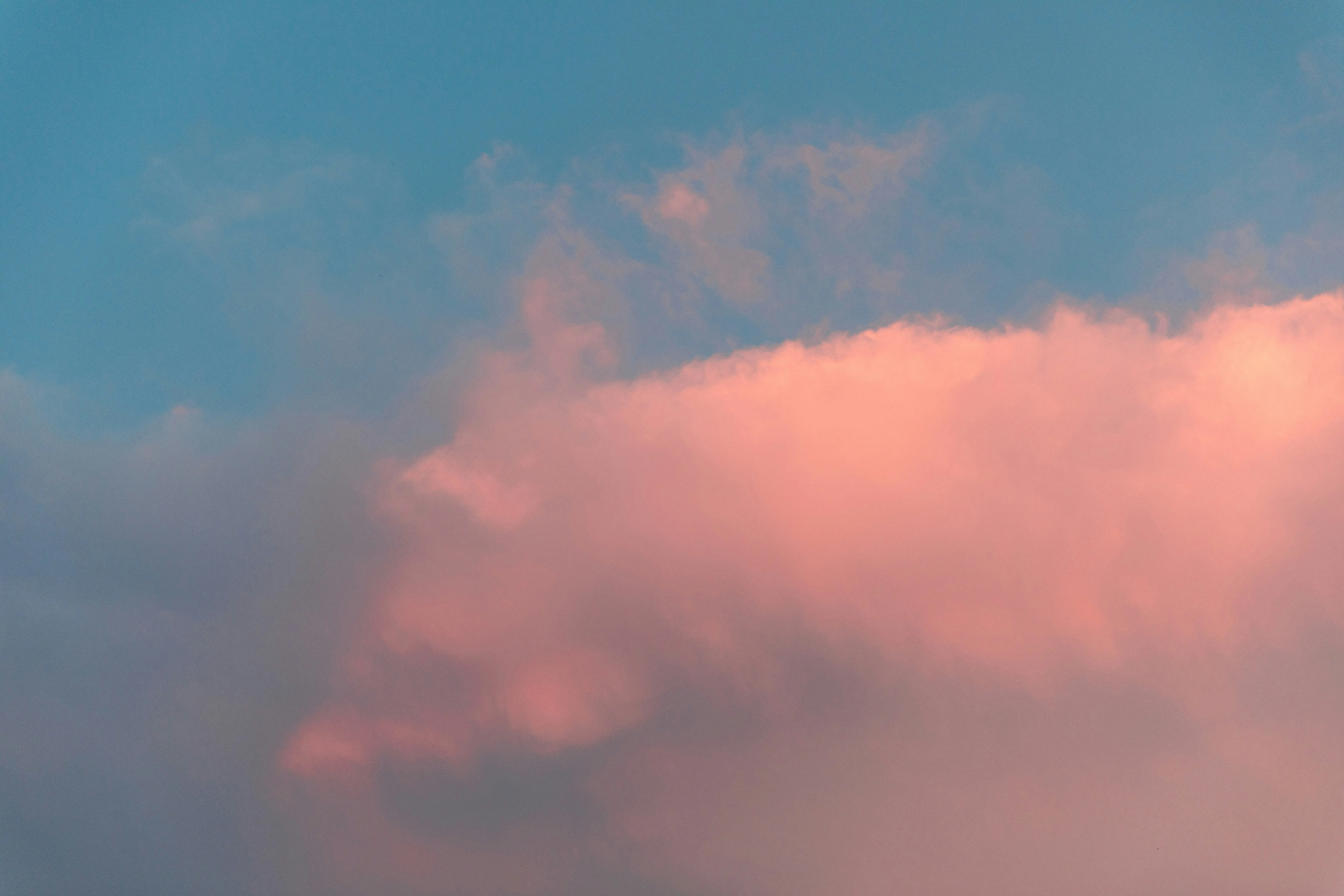 Peaceful Pink Clouds at Sunset in Clear Blue Sky Wallpaper