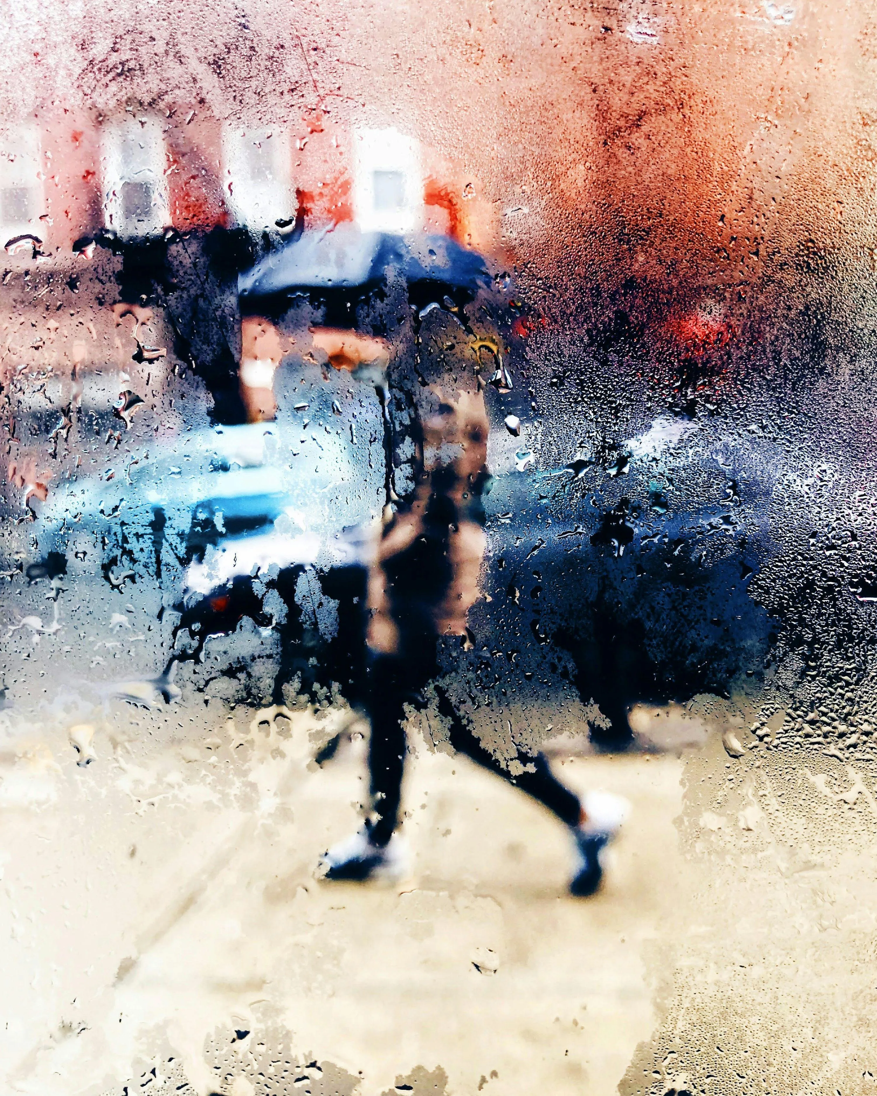 People Caught in Fast Moving Rain Street Shot Image