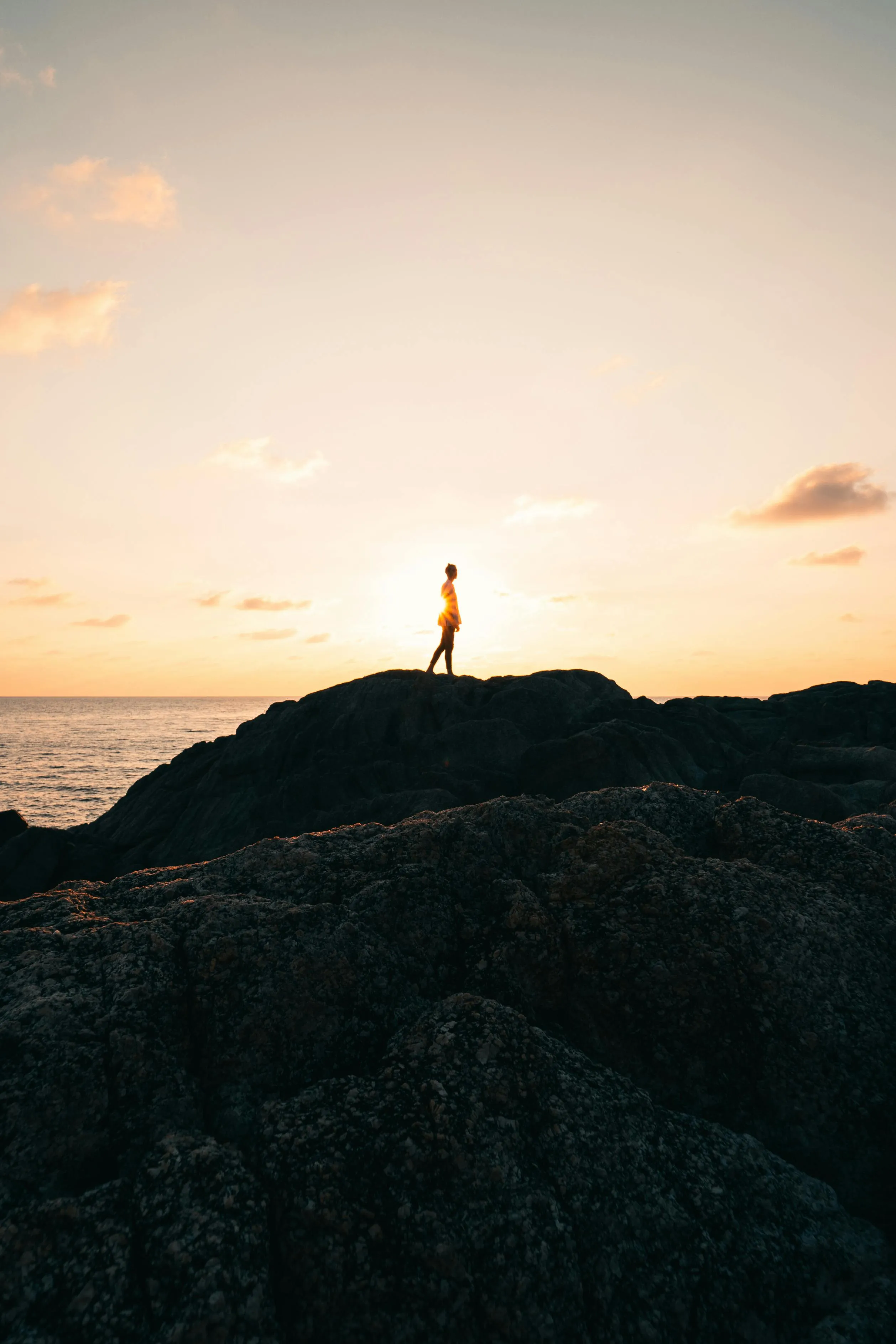 Person Standing on Hilltop Watching Sunrise Wallpaper