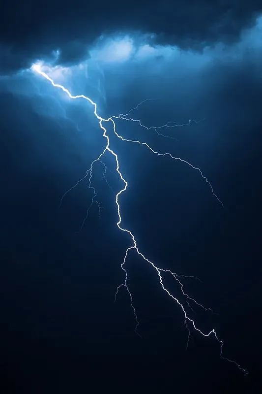 Powerful Lightning Strike in a Dark Night Sky Wallpaper