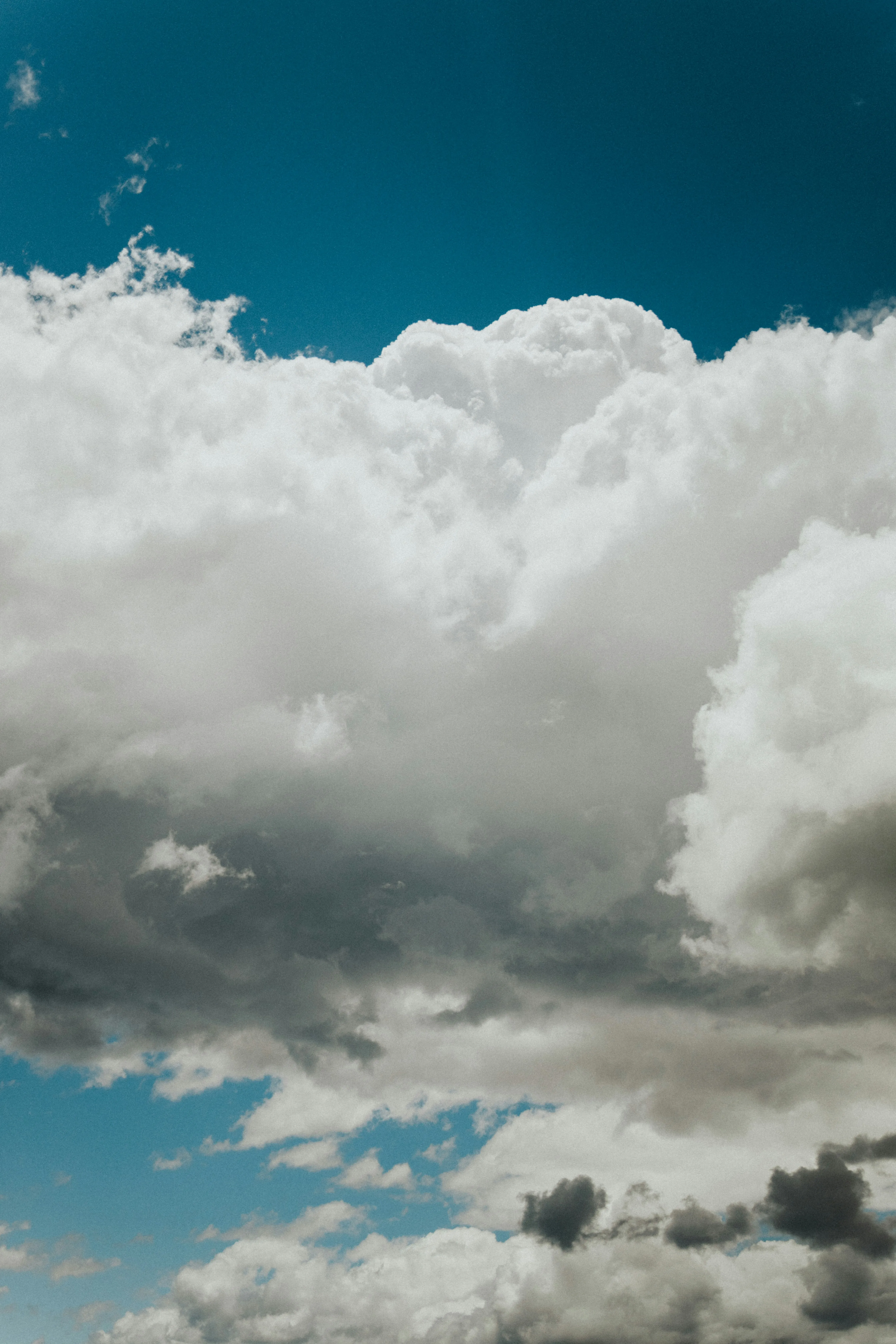 Puffy Clouds Building Over Darker Stormy Base Image HD