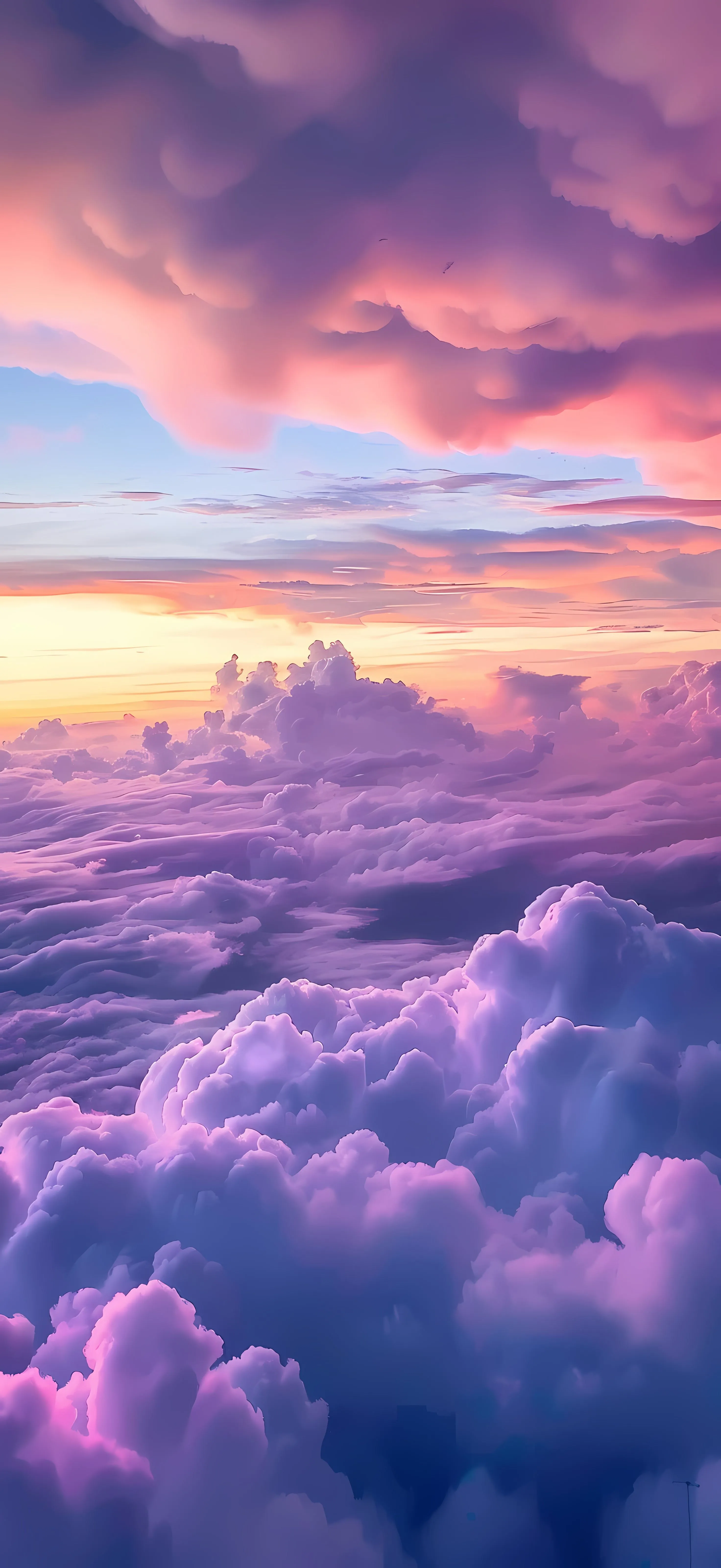 Purple and Pink Clouds at Sunset Over Mountain Landscape