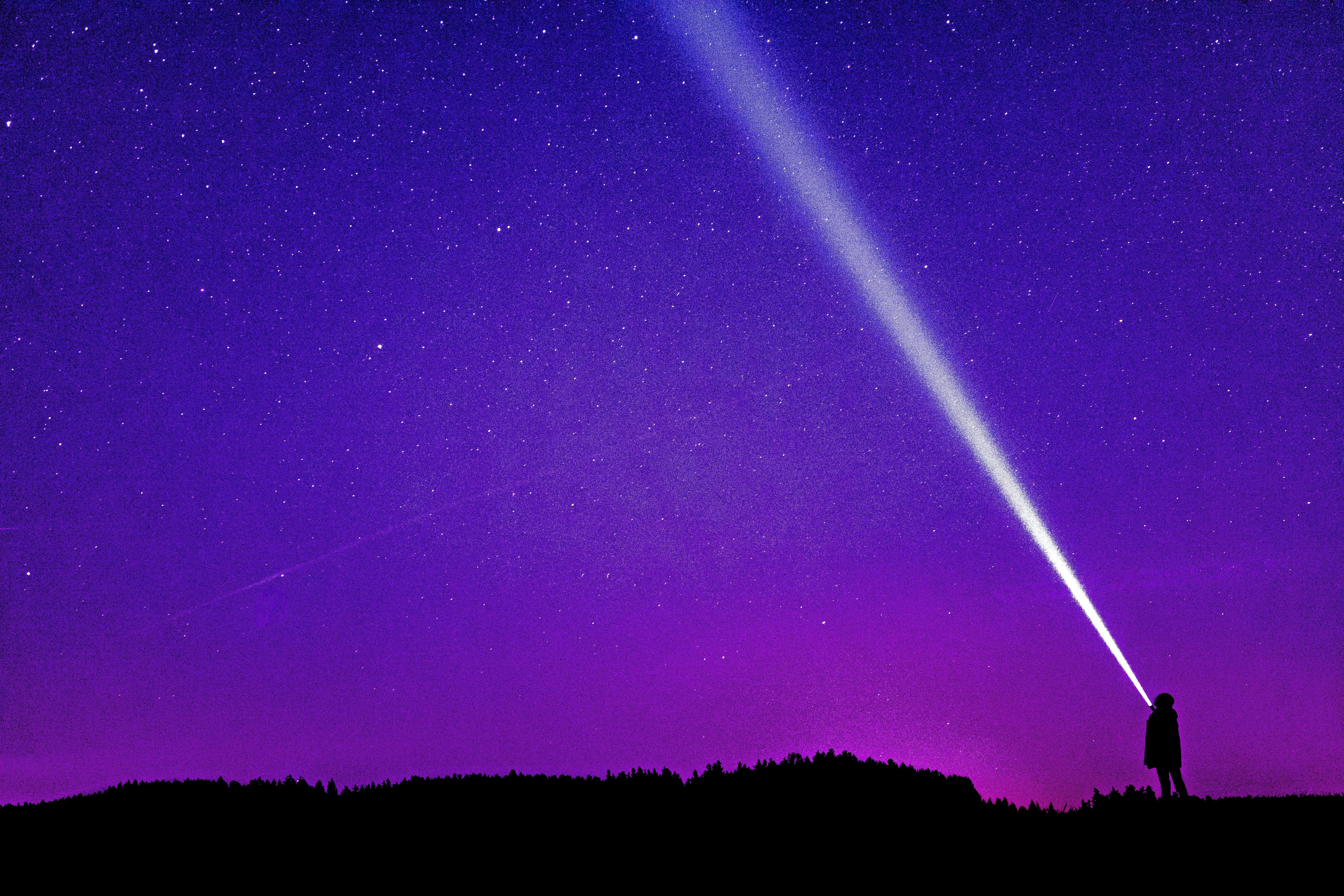 Purple Sky with Cloudy Night and Focused Beam of Light