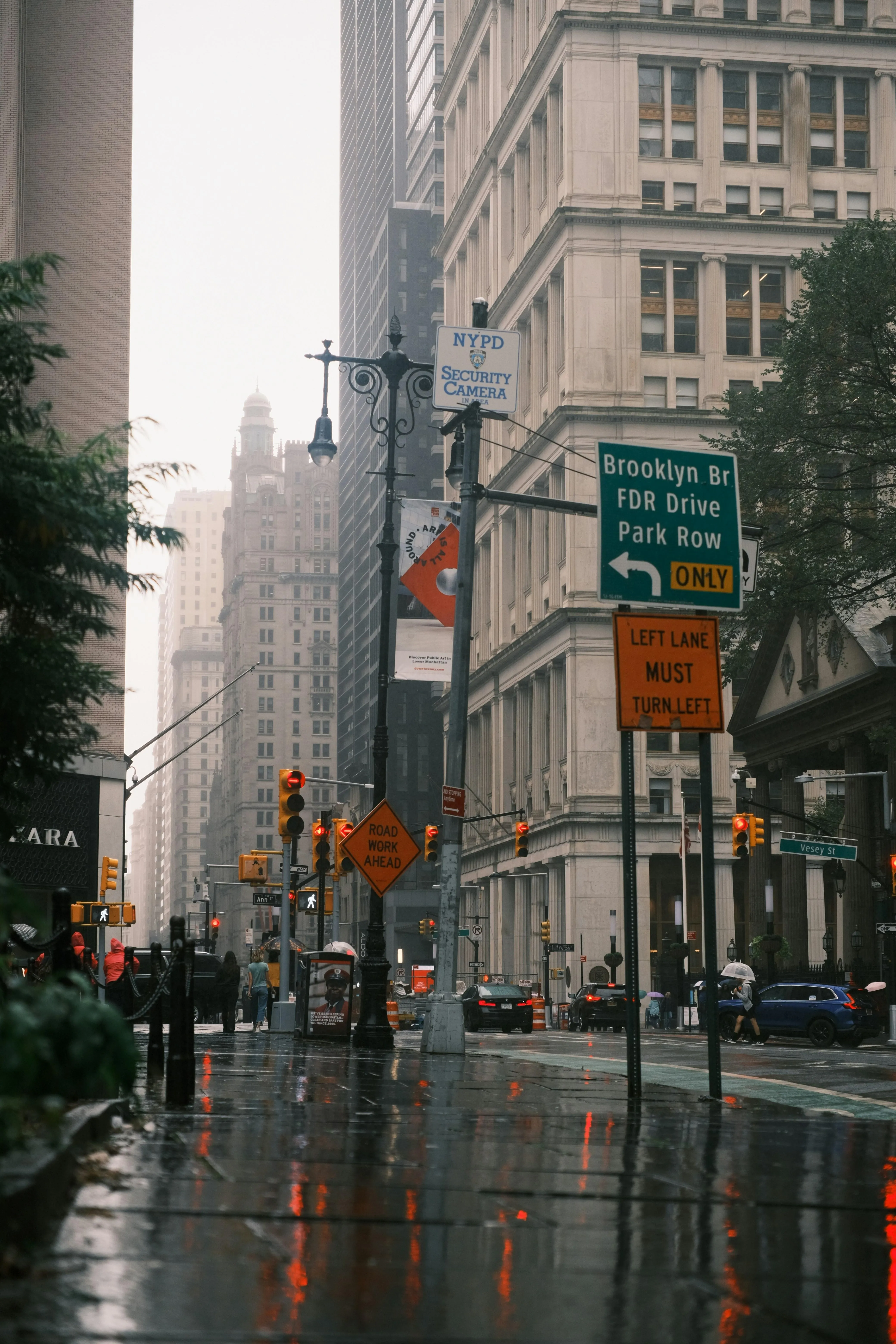 Rain Falling Between Tall Urban Buildings on Cloudy Day