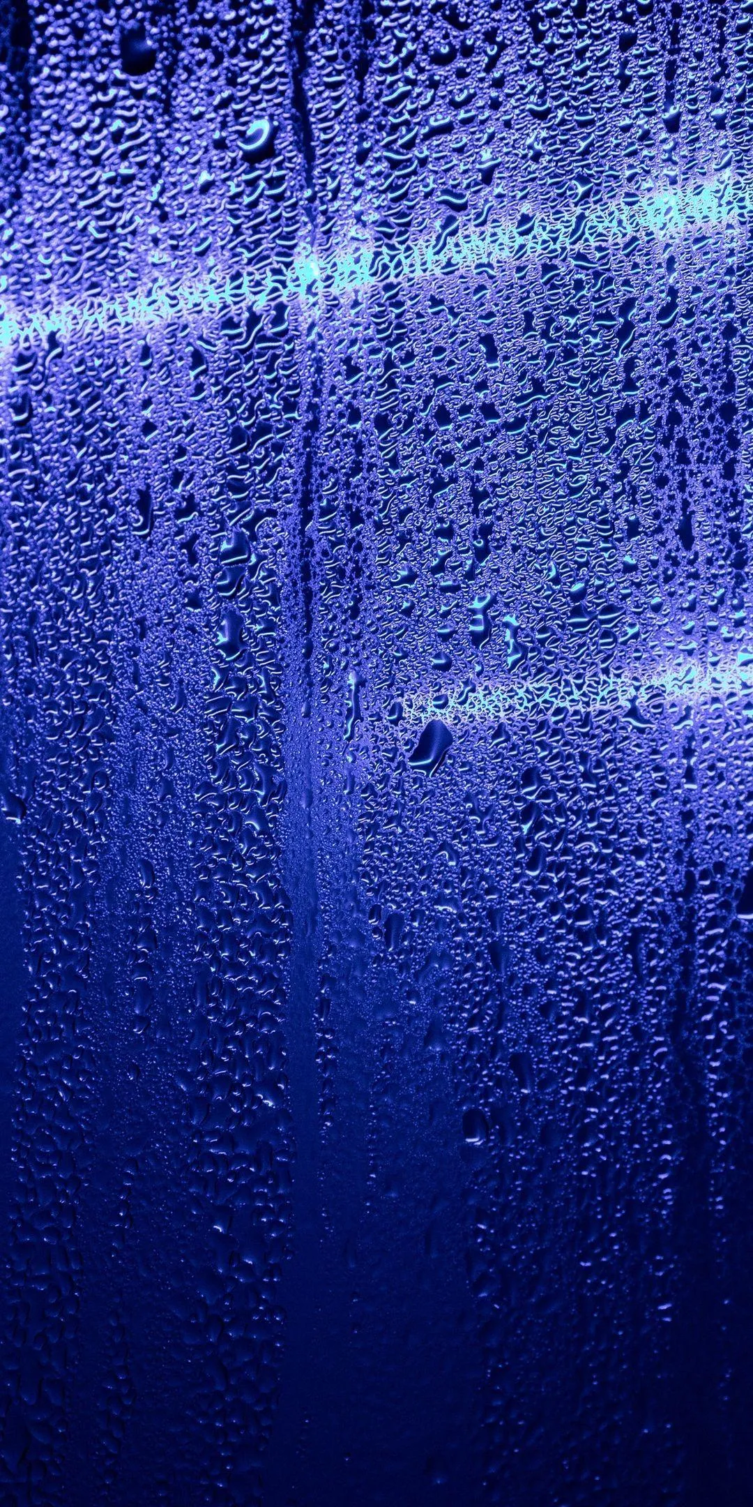 Raindrops Streaking Down Blue Window Glass Wallpaper