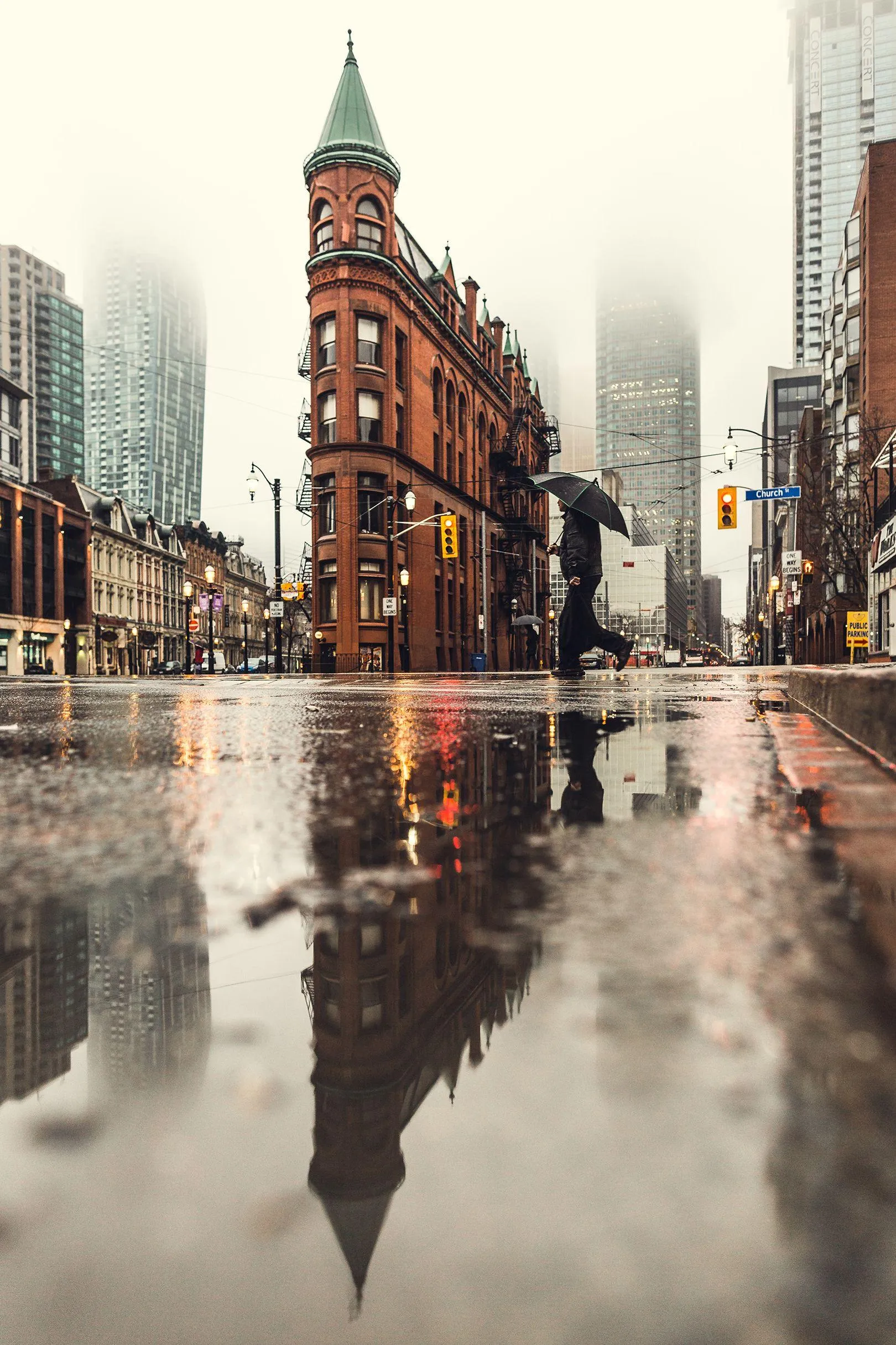 Rainsoaked City Street with Historic Buildings and Lights