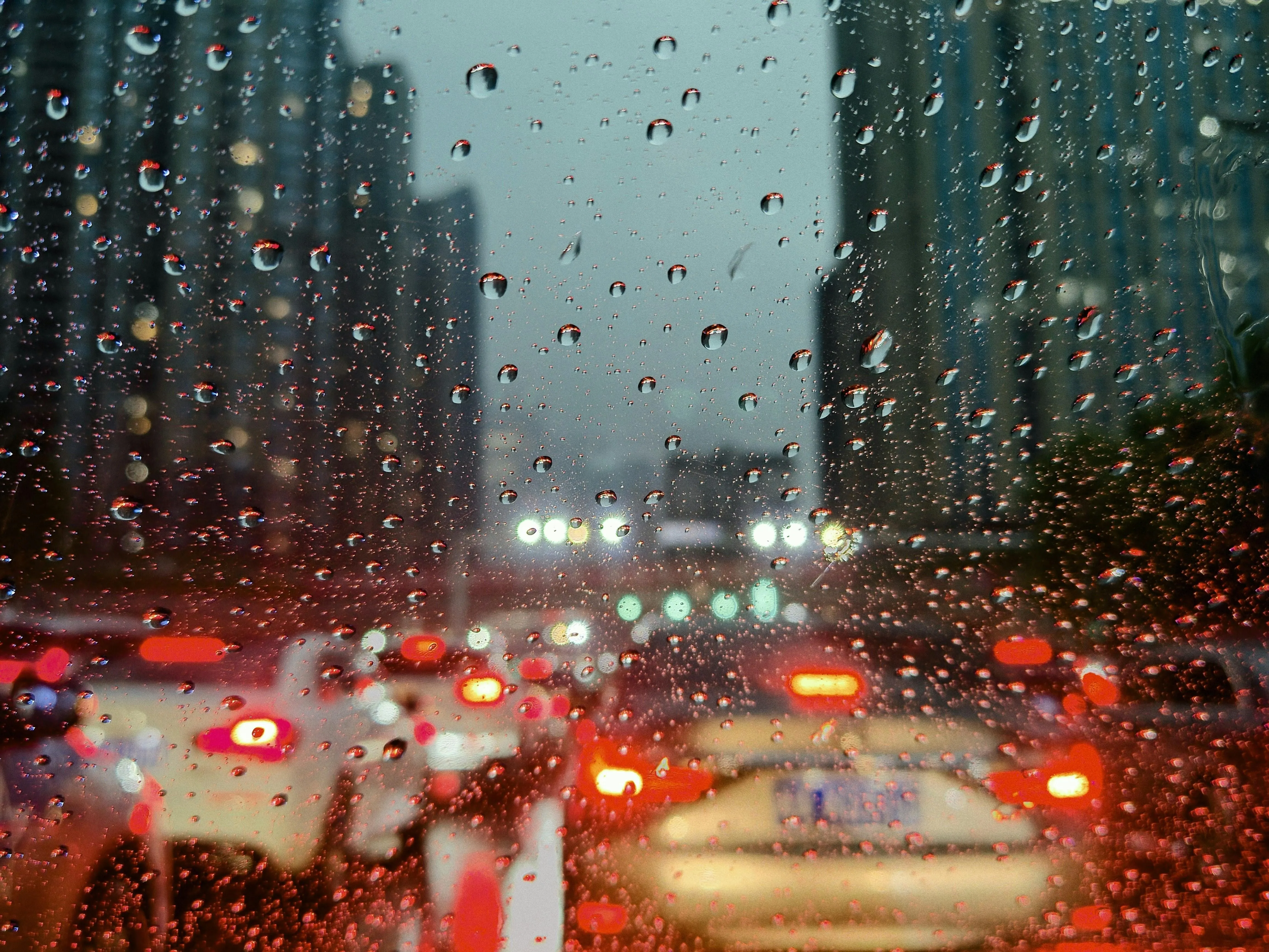 Rainy Traffic Jam Captured Through Windshield Wallpaper