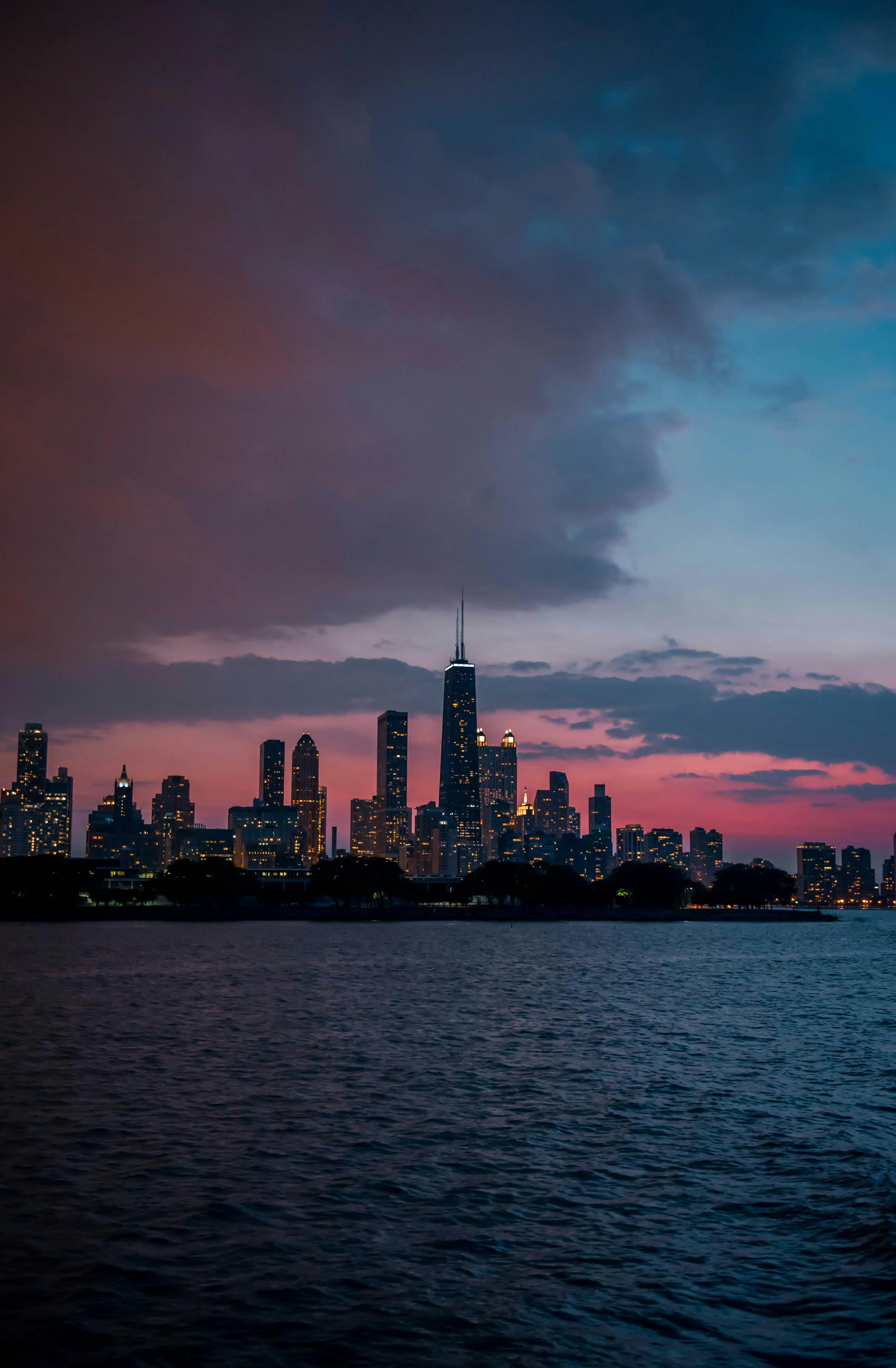Red and Blue Sky Over City Skyline at Sunset Time Wallpaper
