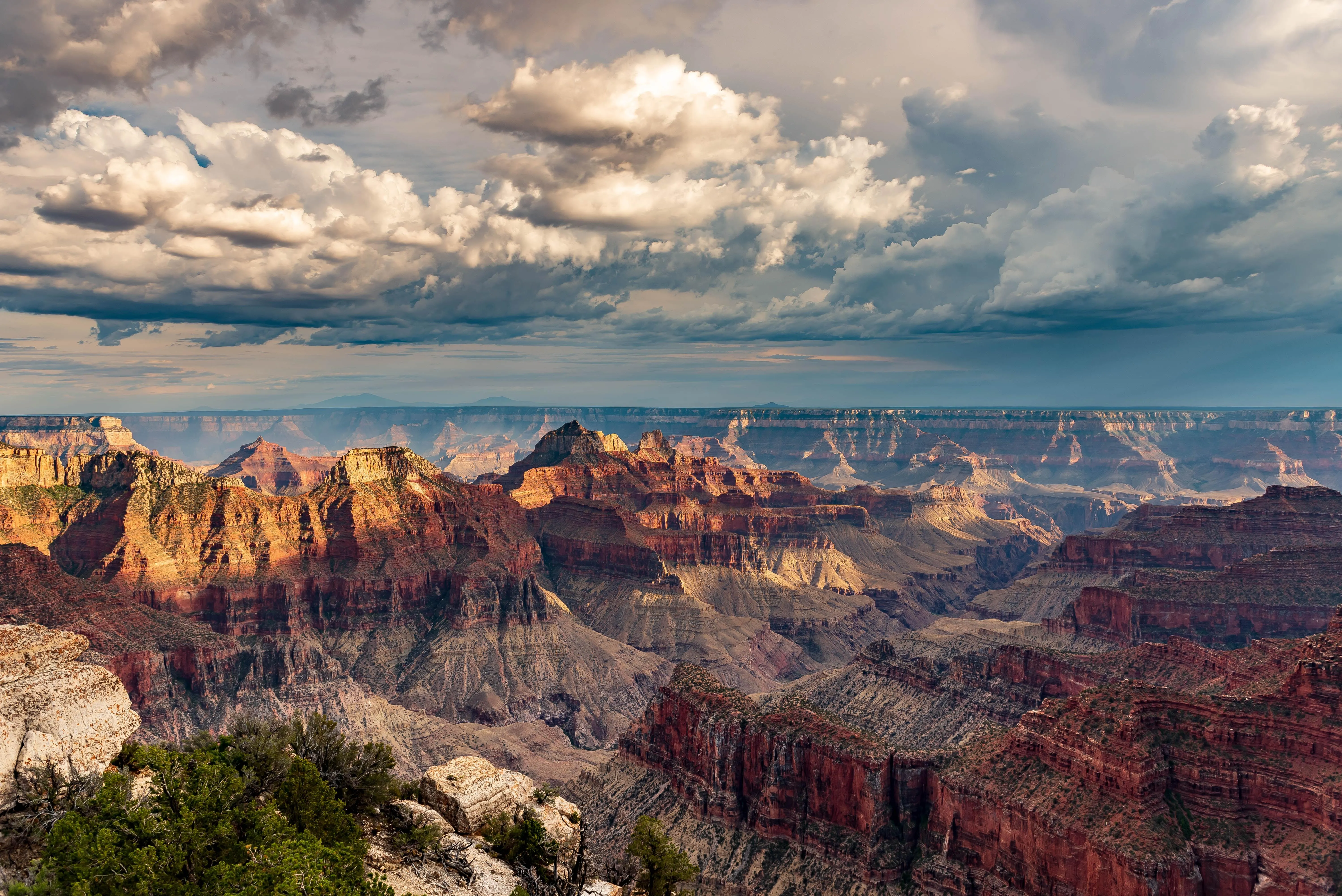 Rocky Mountains Under Dramatic Cloudy Sky Wallpaper
