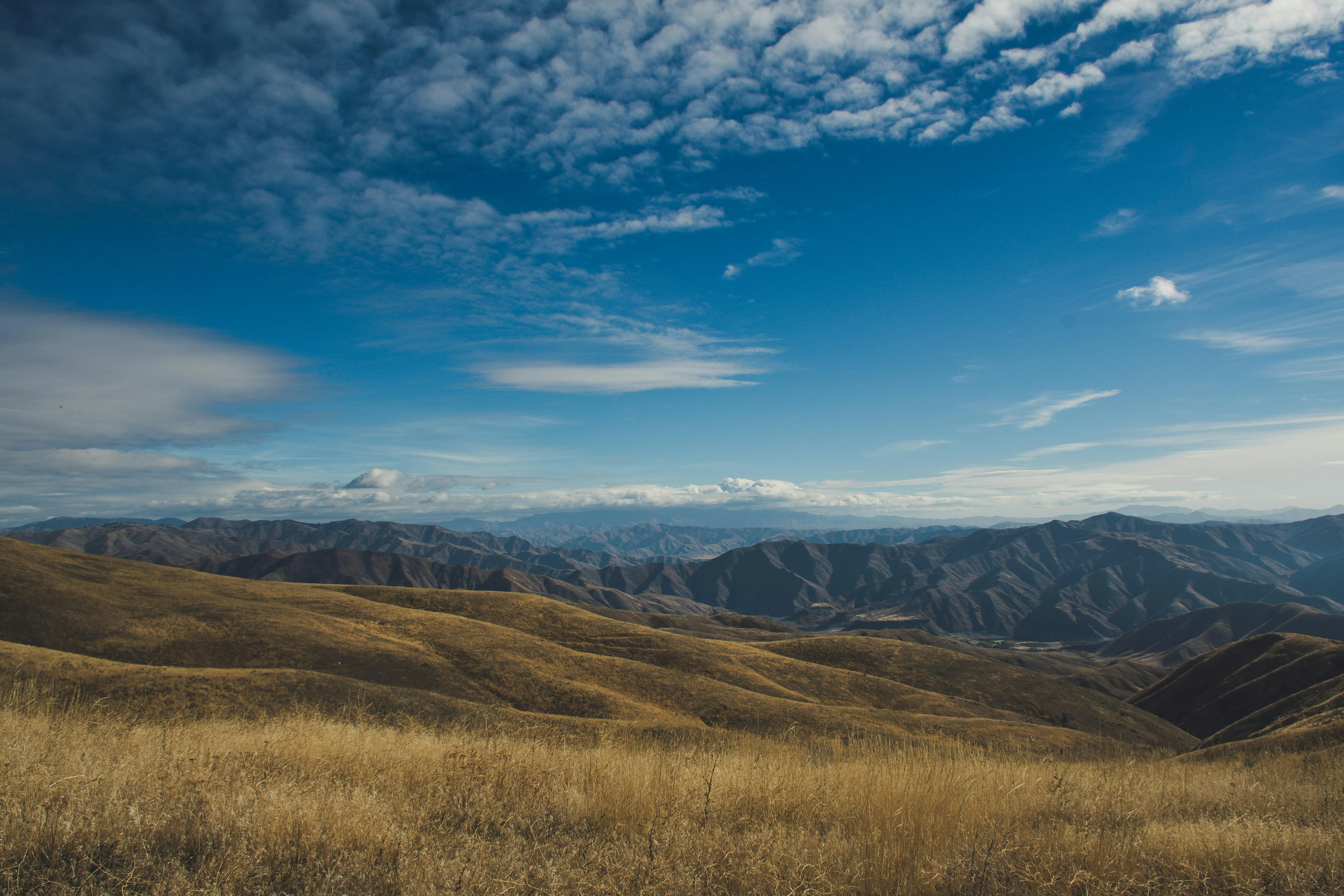 Rolling Clouds Over Scenic Mountain Range Landscape