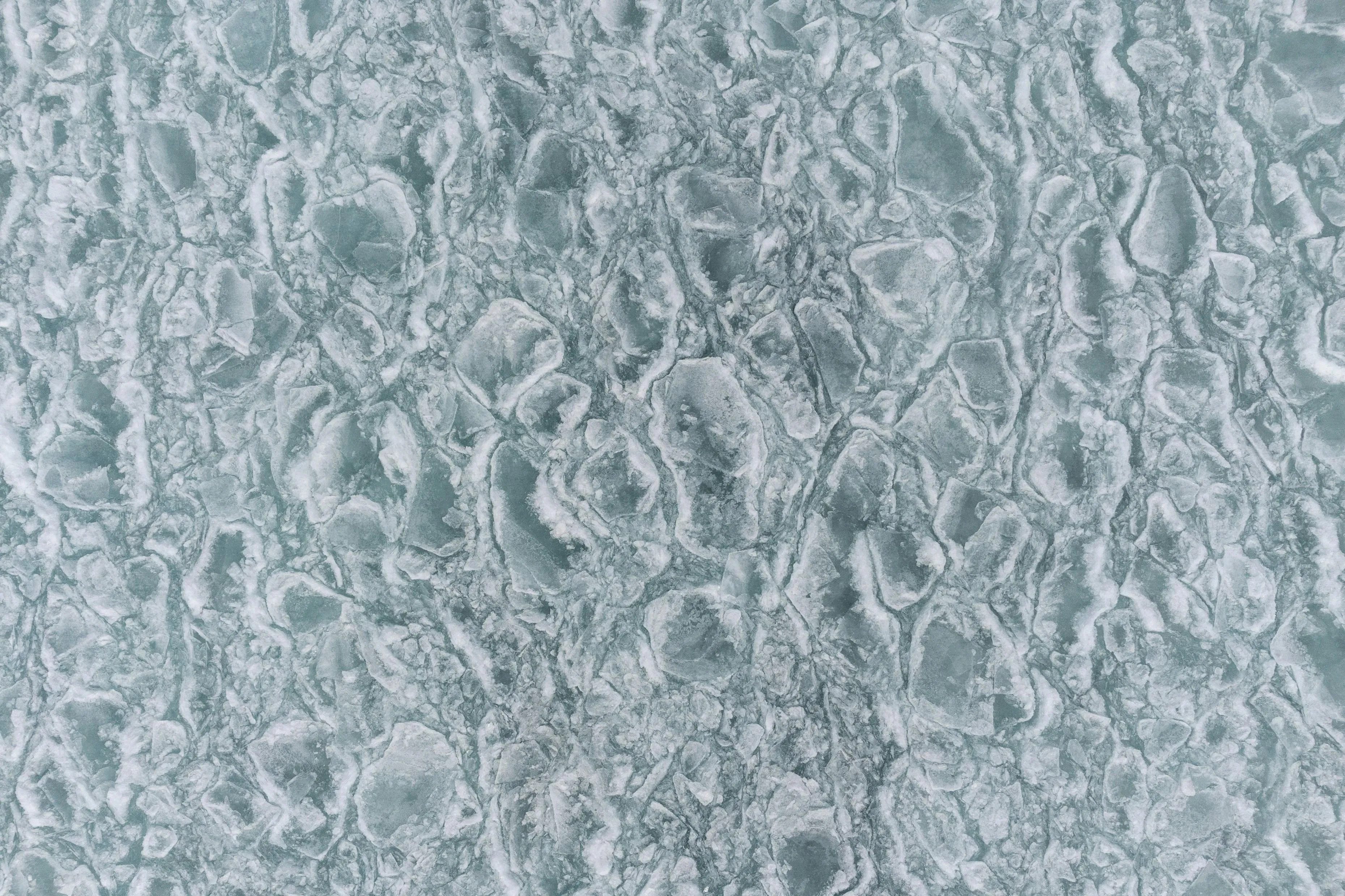 Rough icy texture surface in close up frozen view image