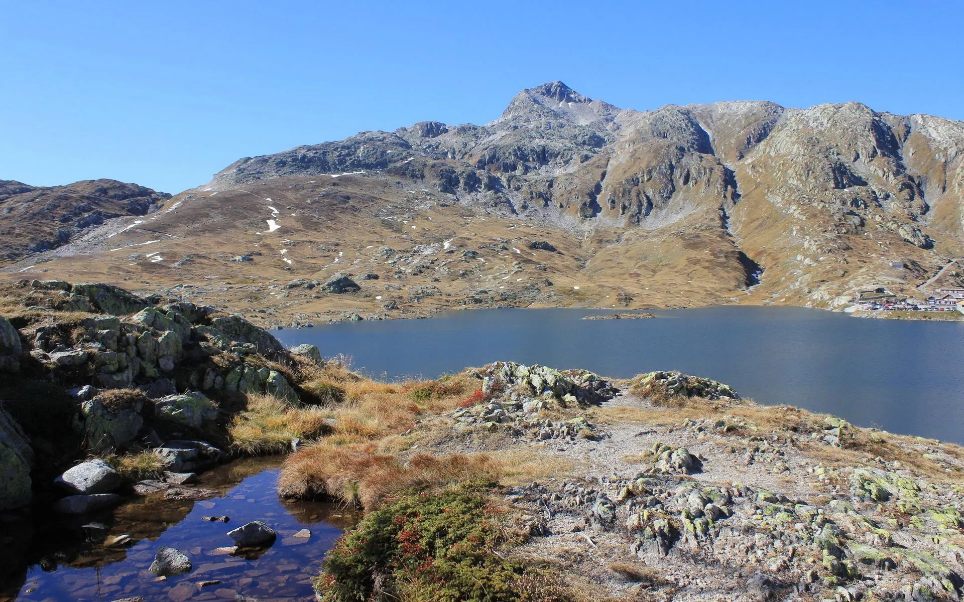Rugged Grey Mountains under Bright Sunny Blue Skies