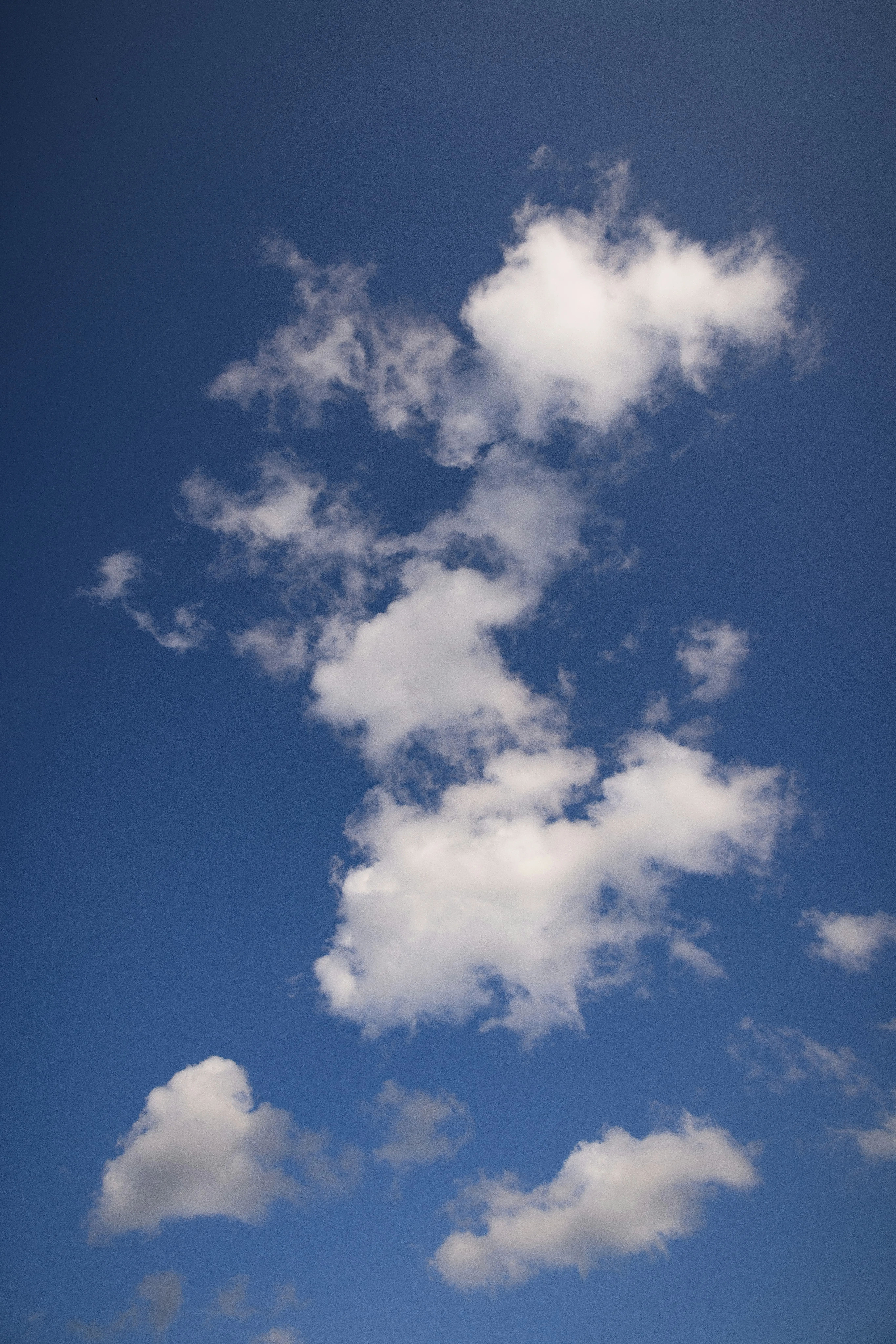Scattered Cumulus Clouds on a Clear Sunny Day Wallpaper