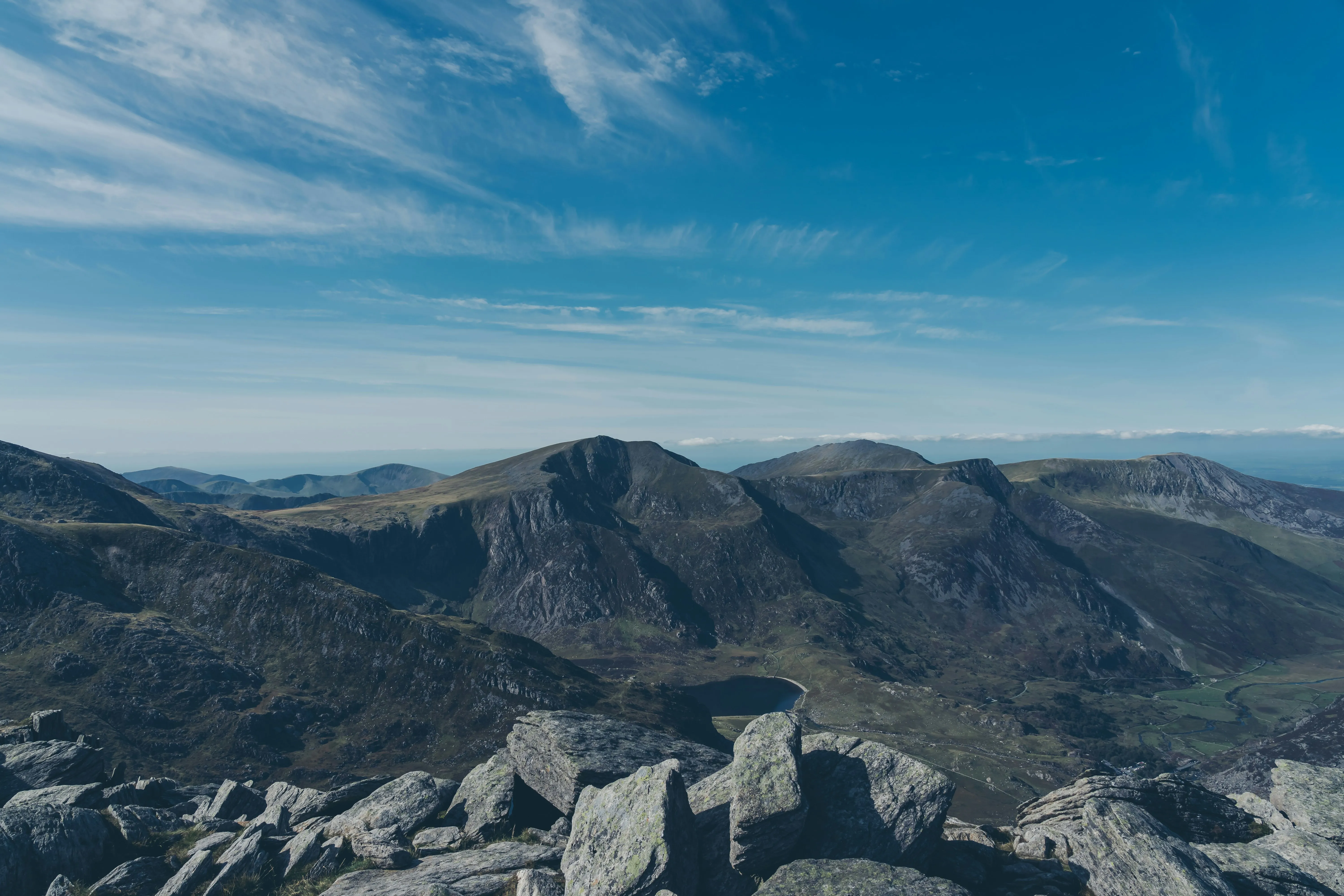 Scenic Mountain Range Beneath a Clear Sky Horizon Image