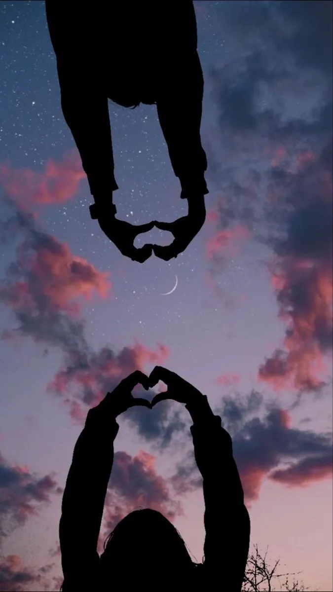 Silhouettes Making Heart Shape Under Stars and Crescent Moon