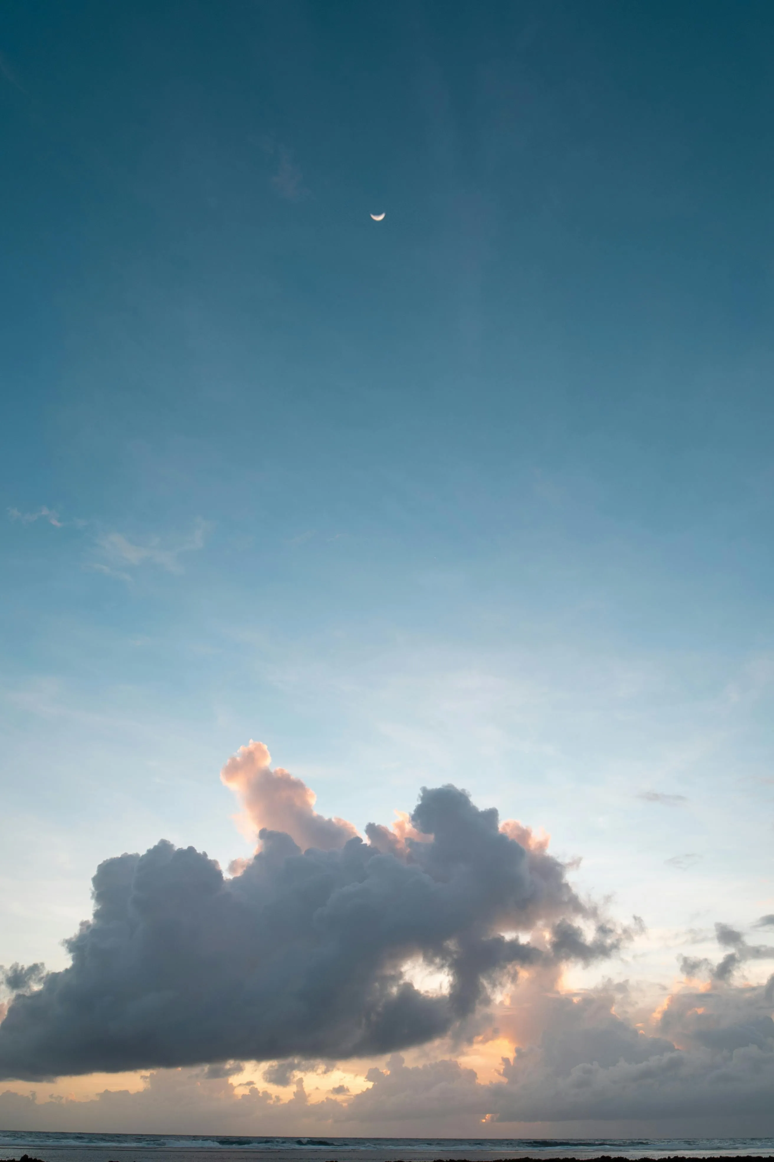 Single Puffy Cloud Against a Clear Blue Morning Sky