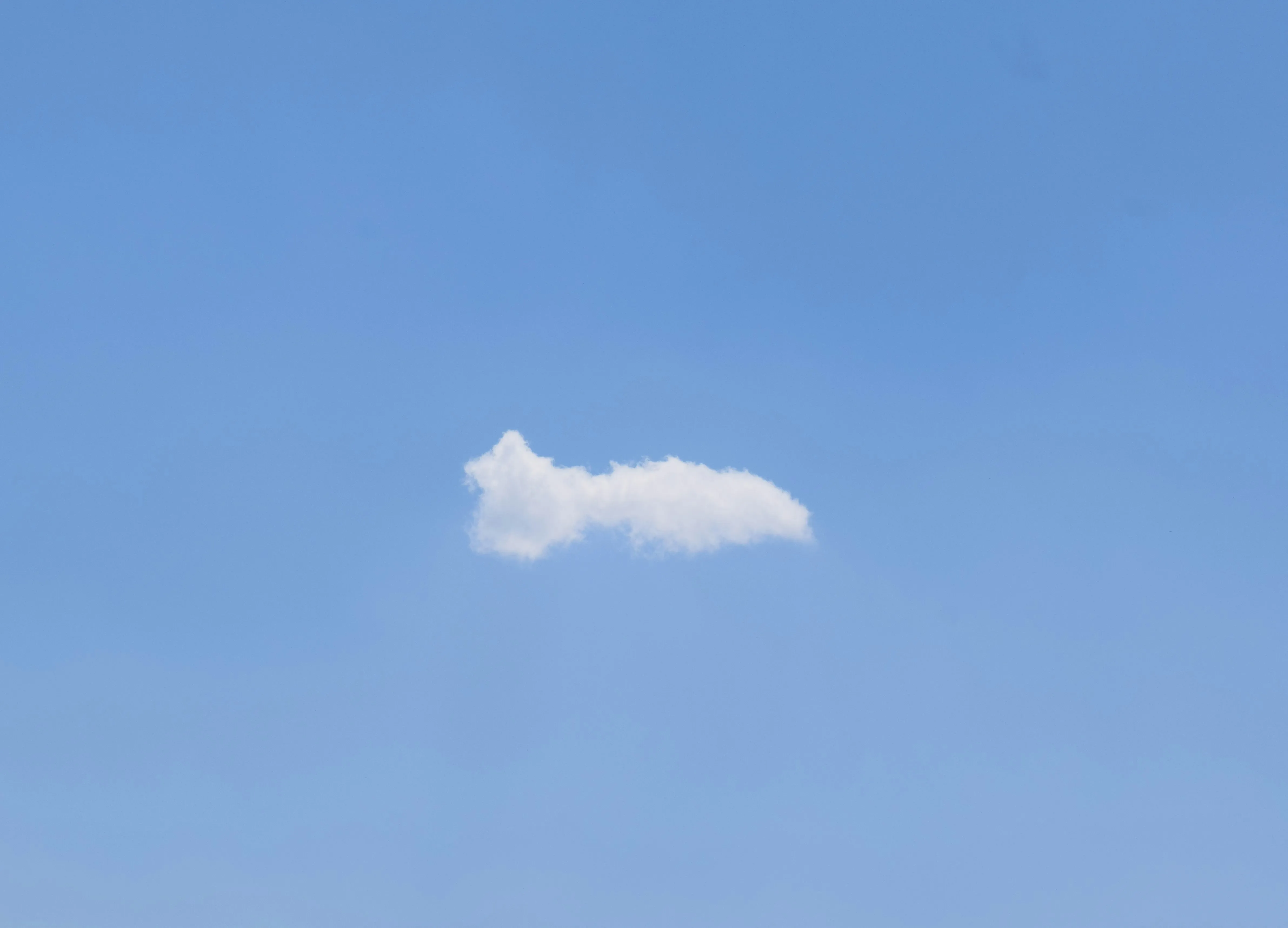Single Small White Cloud Floating in Clear Blue Sky Wallpaper