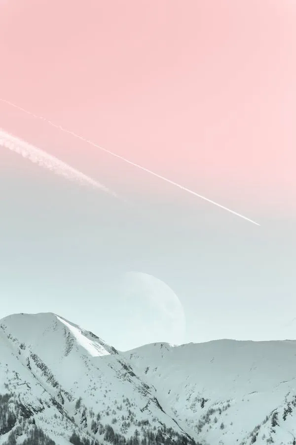 Snow Covered Mountains with Soft Pink Sky Free Image