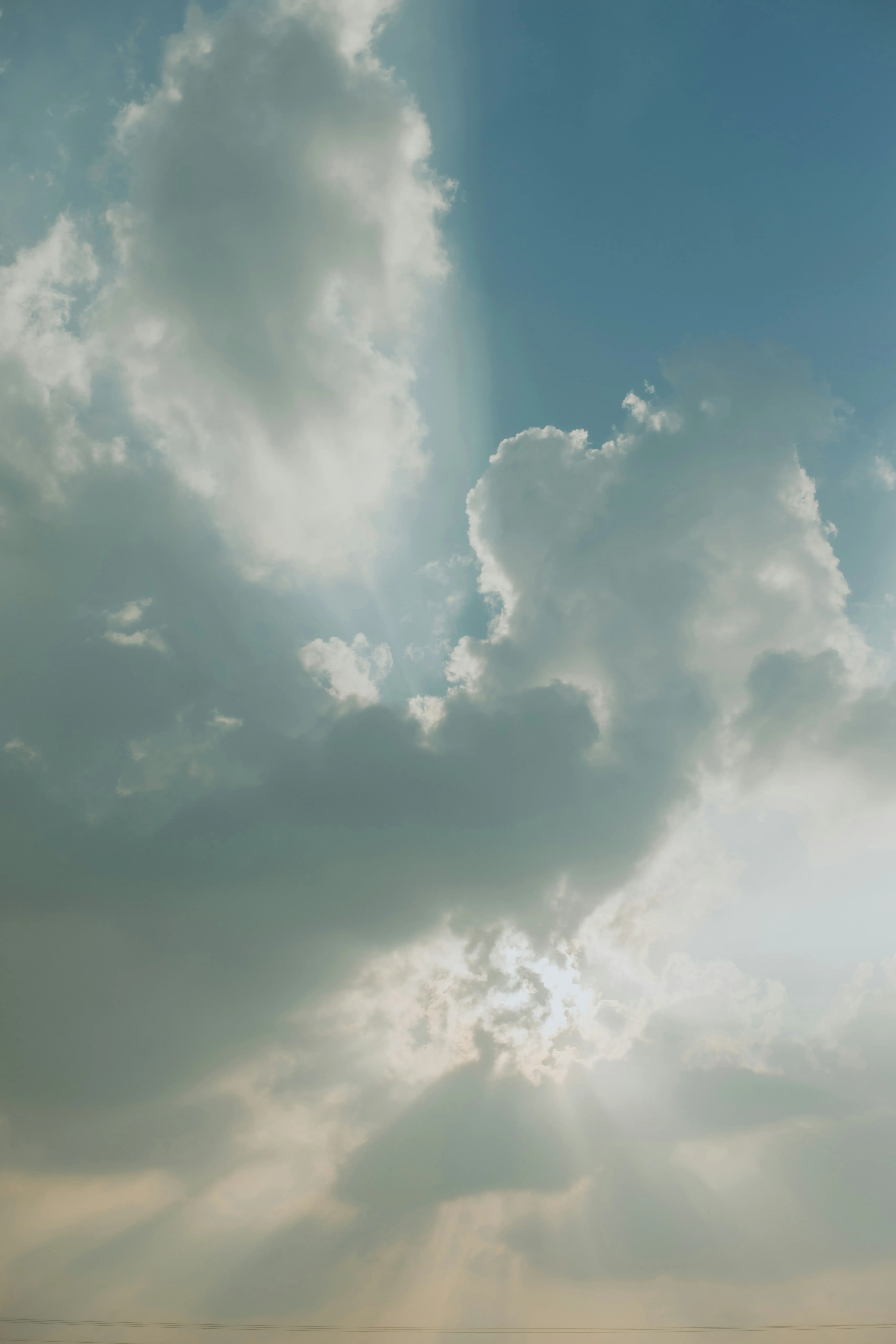 Soft Light Filtering Through Thin Dreamy Clouds Image