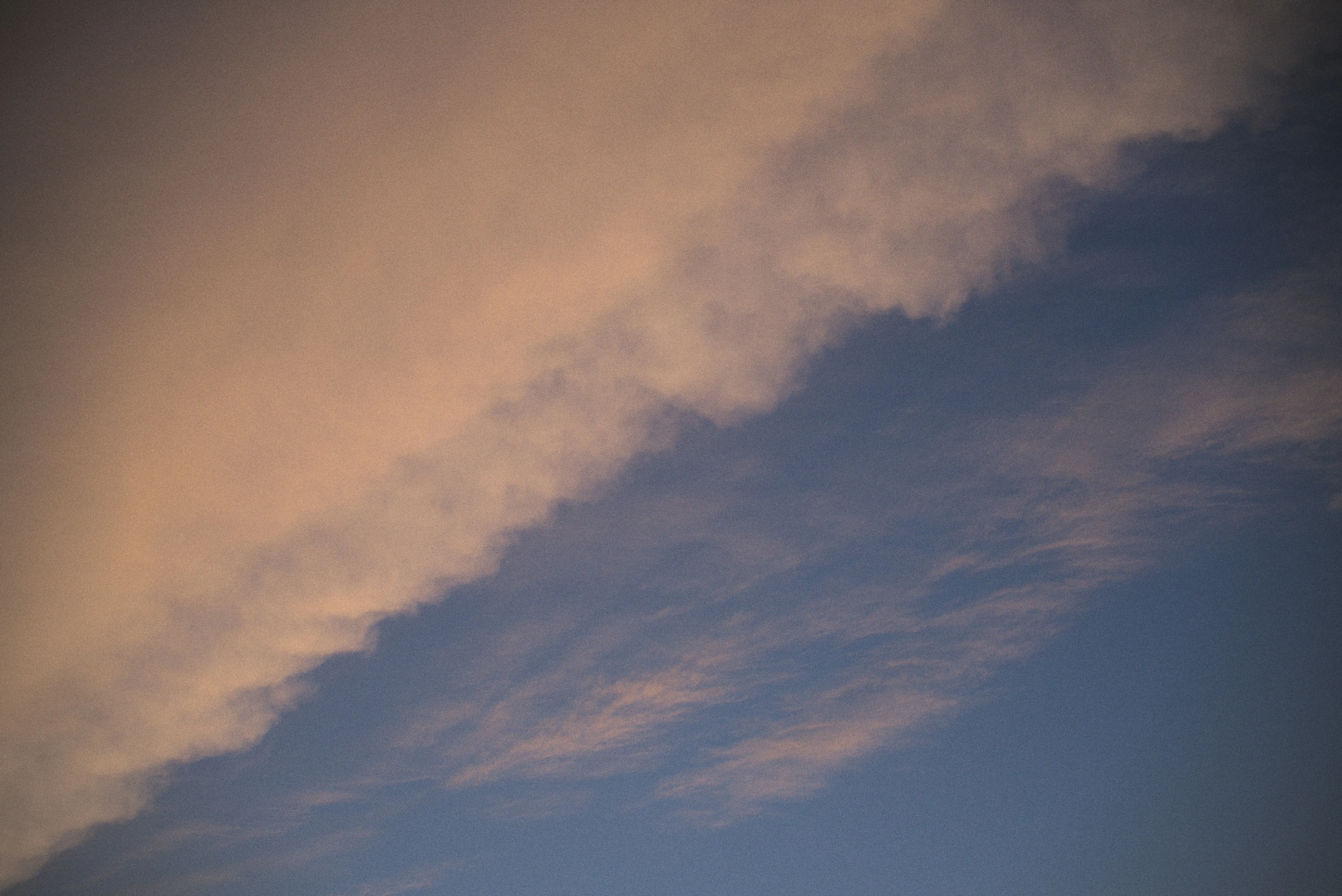 Soft Orange and Pink Clouds in Early Morning Or Evening Sky