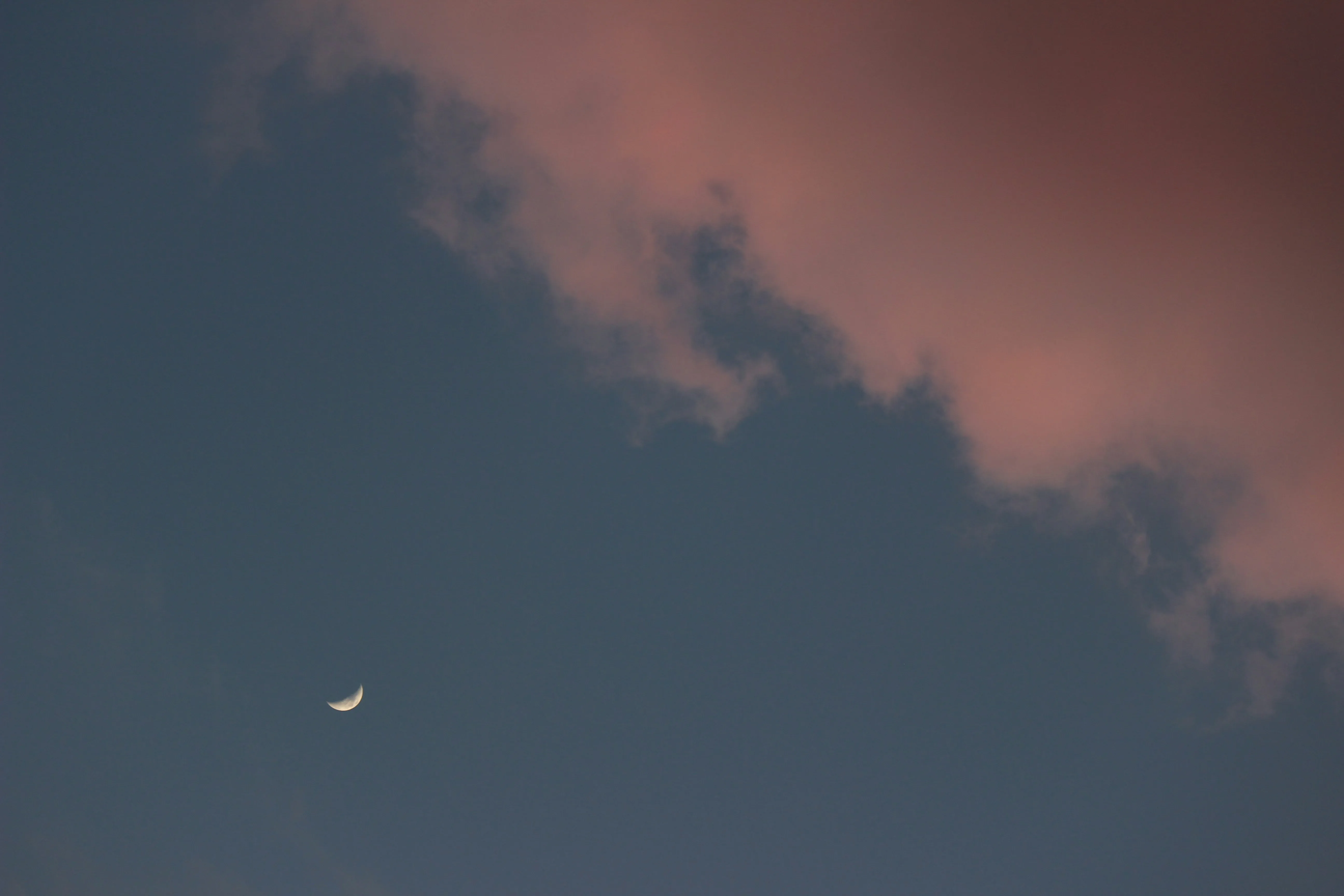 Soft Pink and Blue Sky with Light Clouds and Moon Image