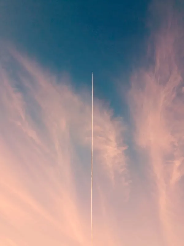 Soft Pink Sunset Clouds Stretching Across the Sky Image