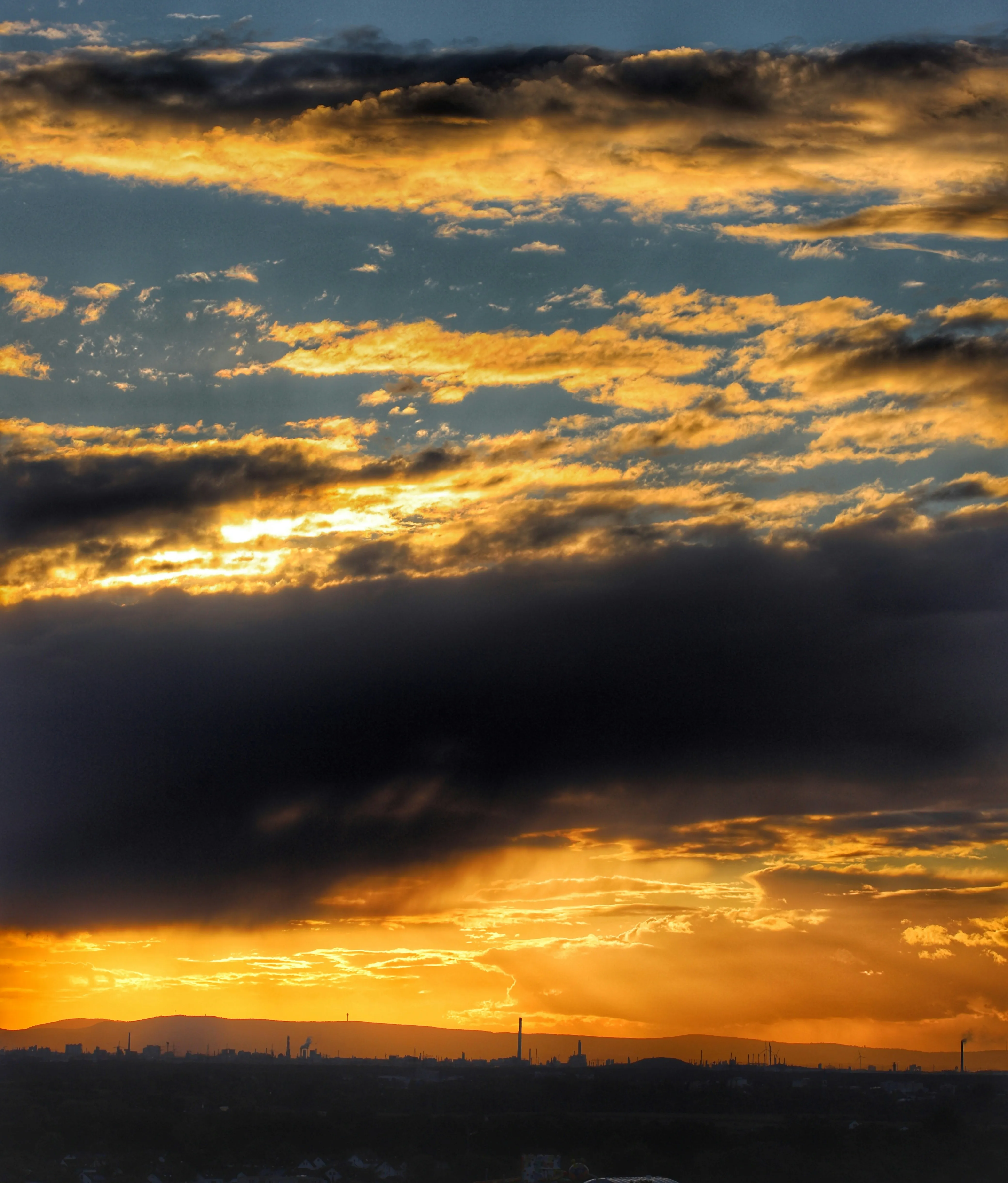 Stunning Sunset Sky with Vibrant Cloud Layers Wallpaper