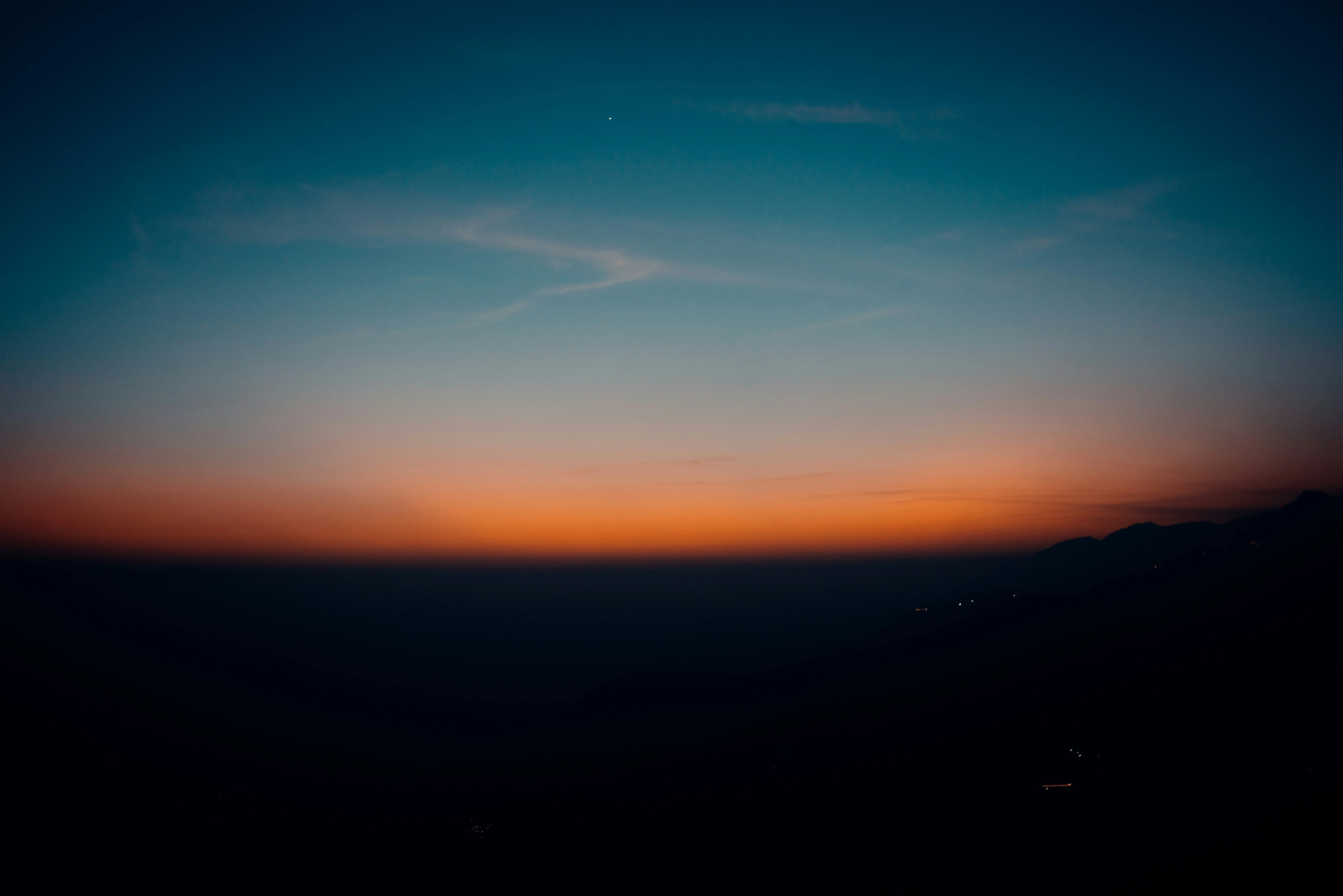 Sunset Horizon with Deep Blue and Orange Gradients in Sky