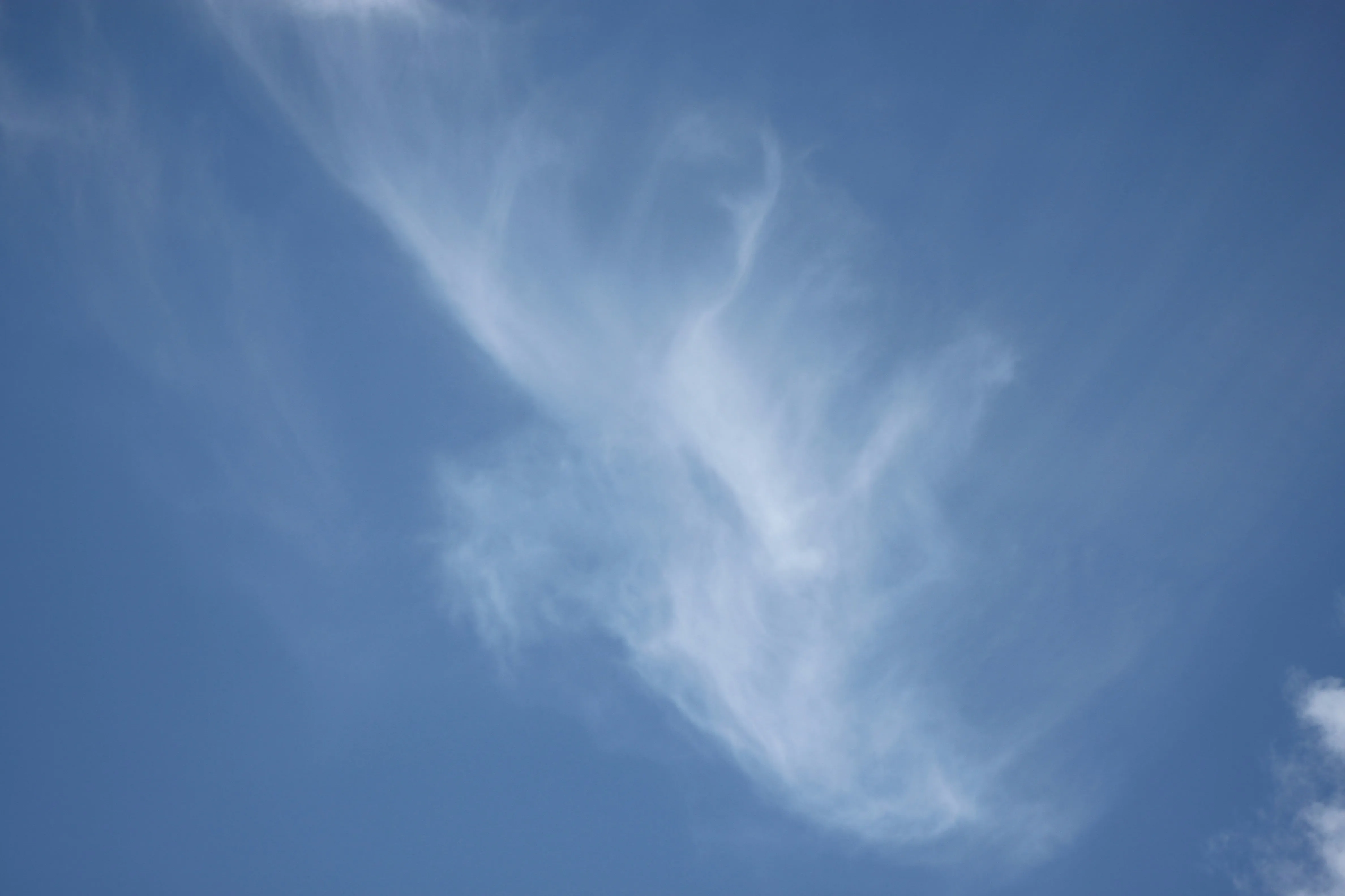 Thin Wispy Clouds Stretching Across Clear Blue Sky 8K
