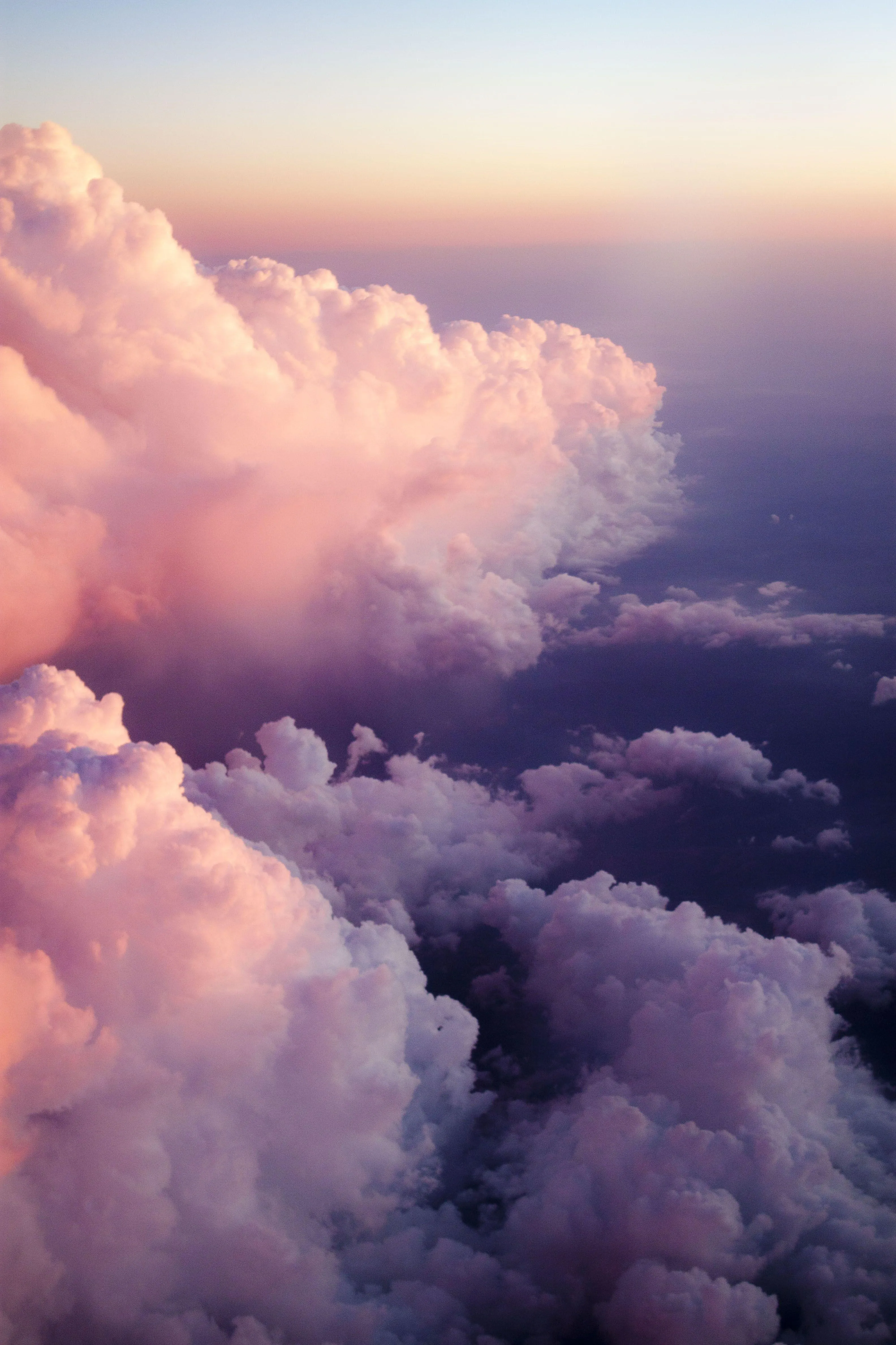 Towering Cumulus Clouds Glowing in Evening Sunlight