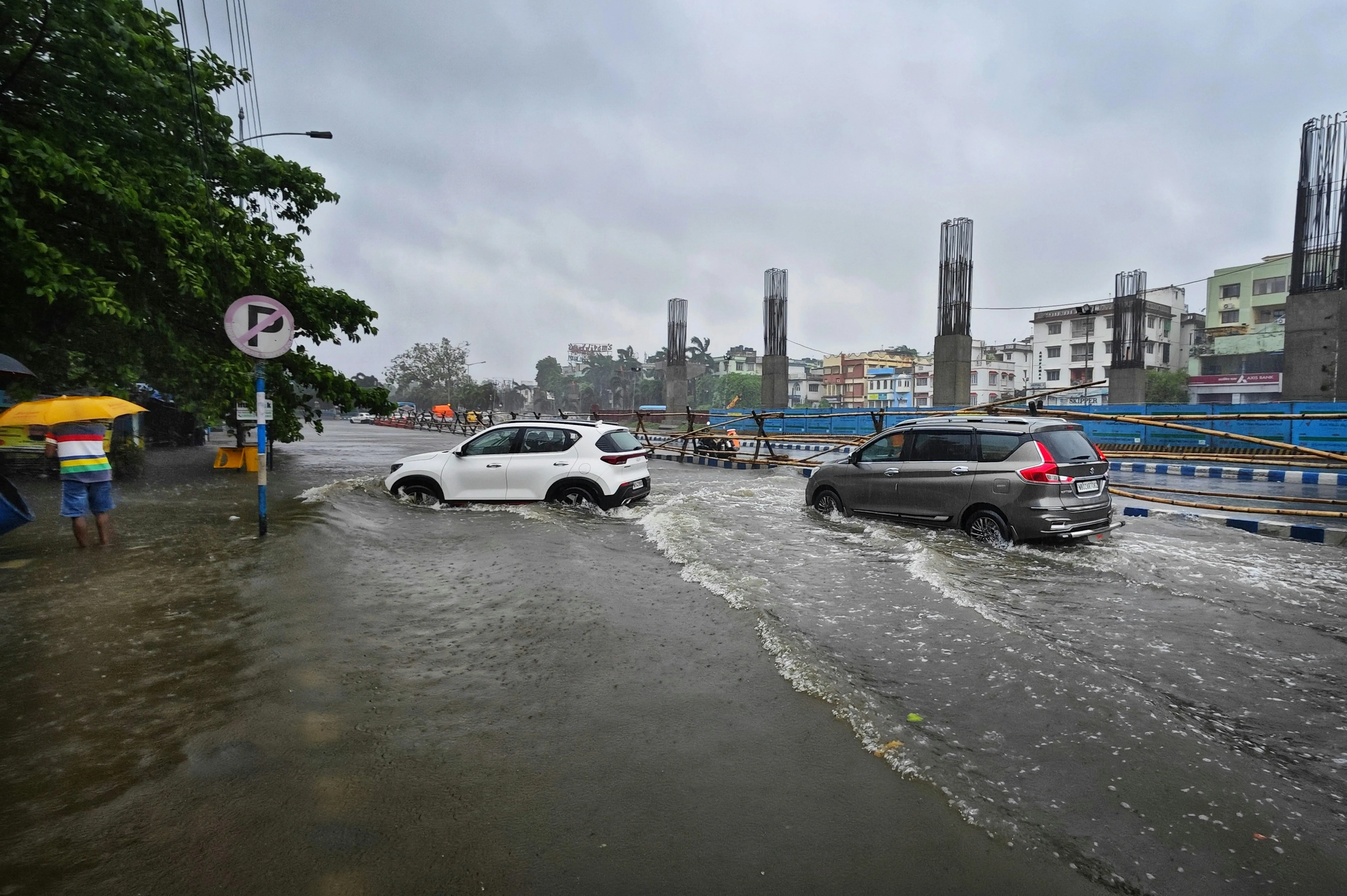 Traffic in Rain Viewed From Windshield Perspective