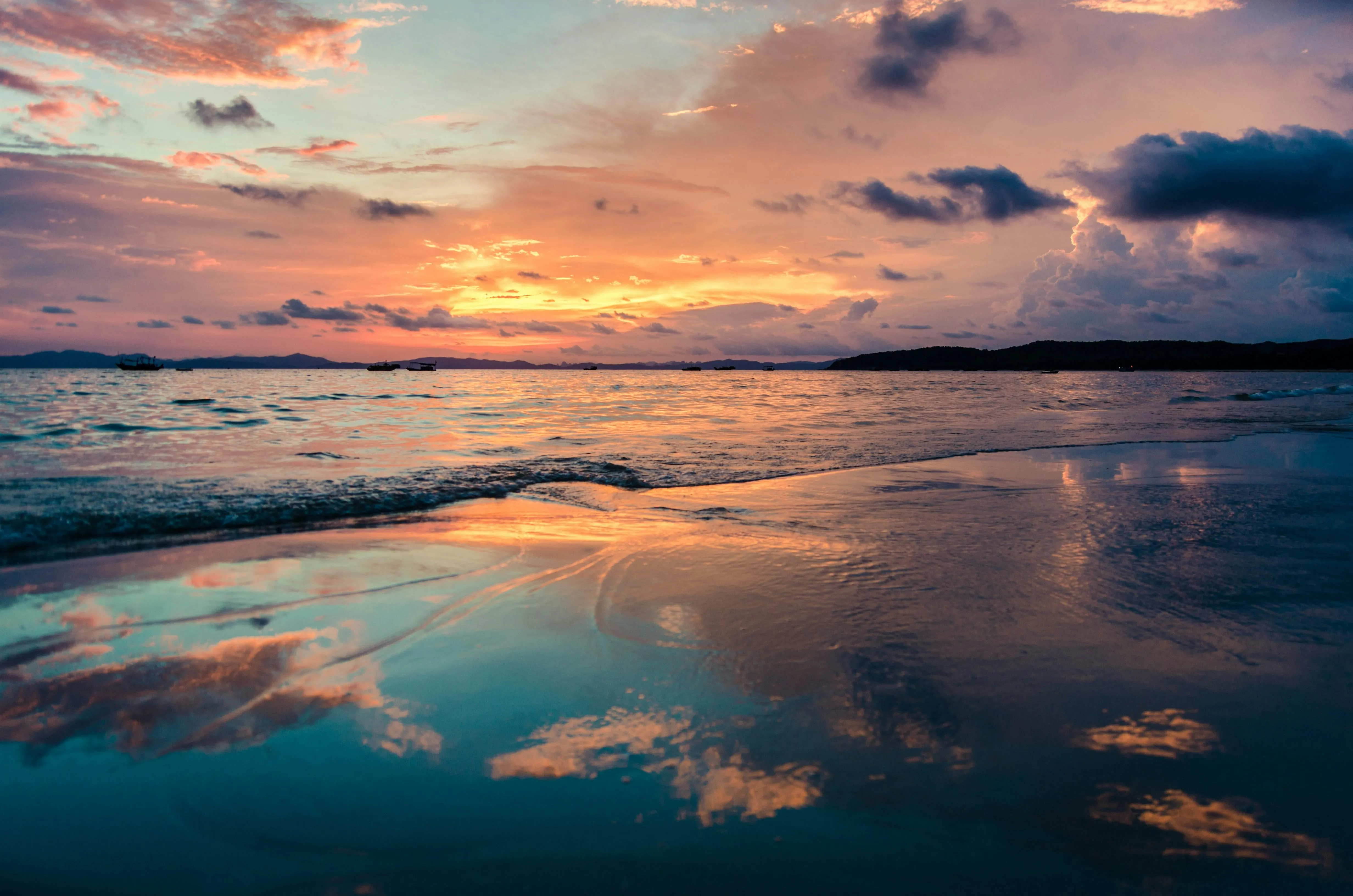 Tranquil Water Scene with Soft Clouds and Evening Light