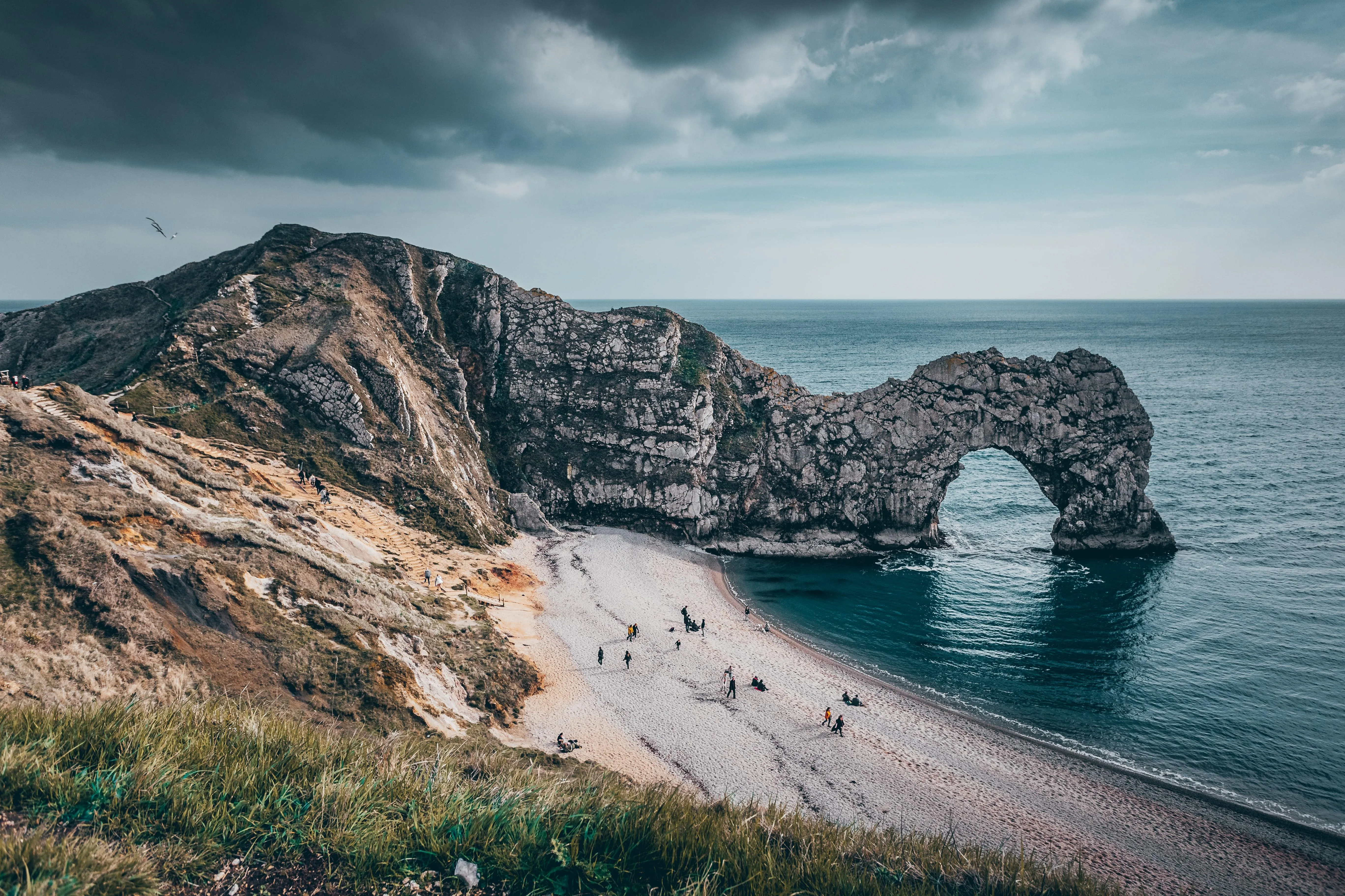 Twin Sea Arches with Waves and Rocky Shoreline image