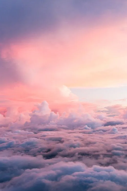 Vast Clouds Glowing Pink Under the Evening Sky Wallpaper 4K