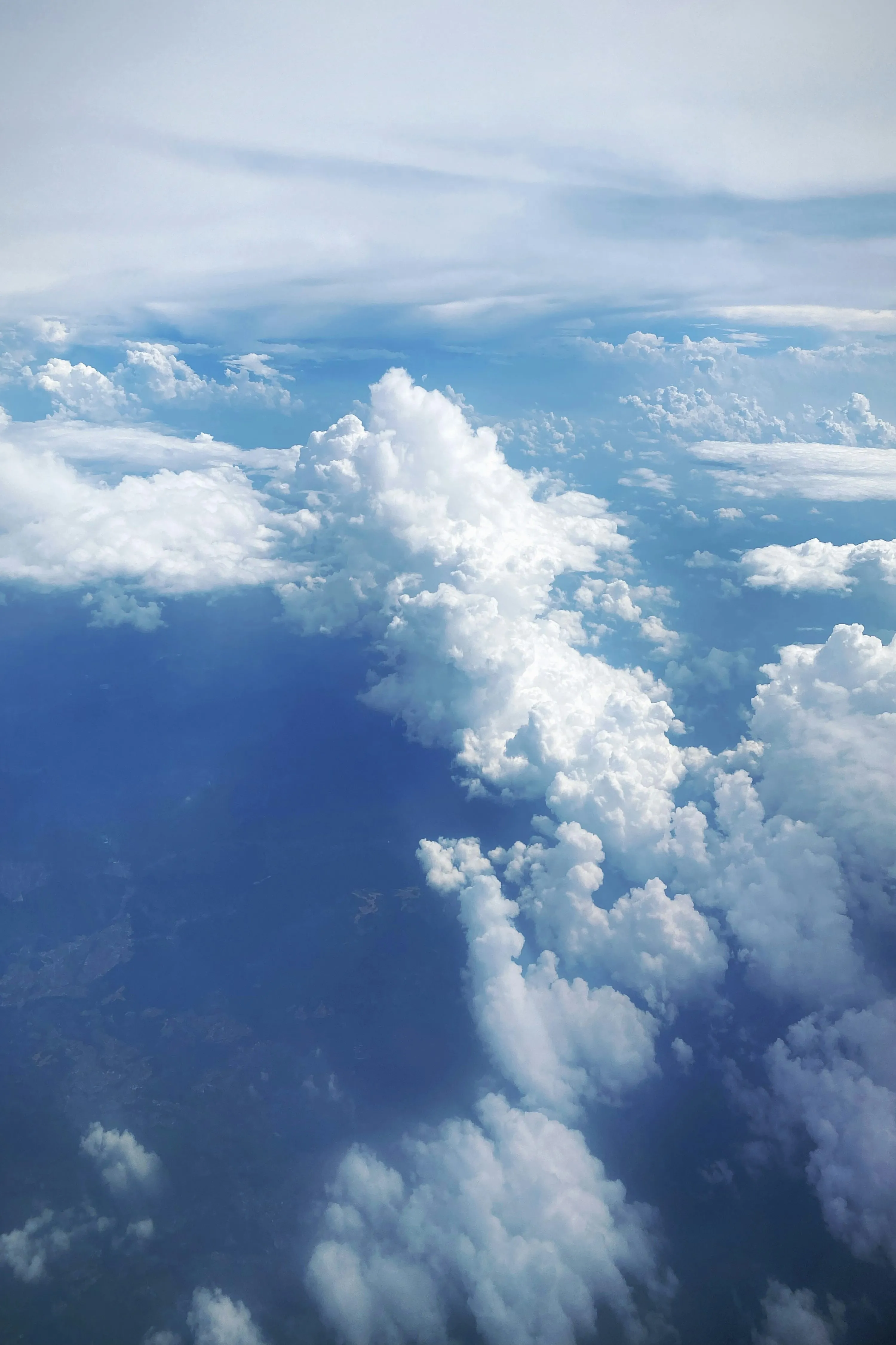 View From Airplane Above Thick Cloud Cover Wallpaper