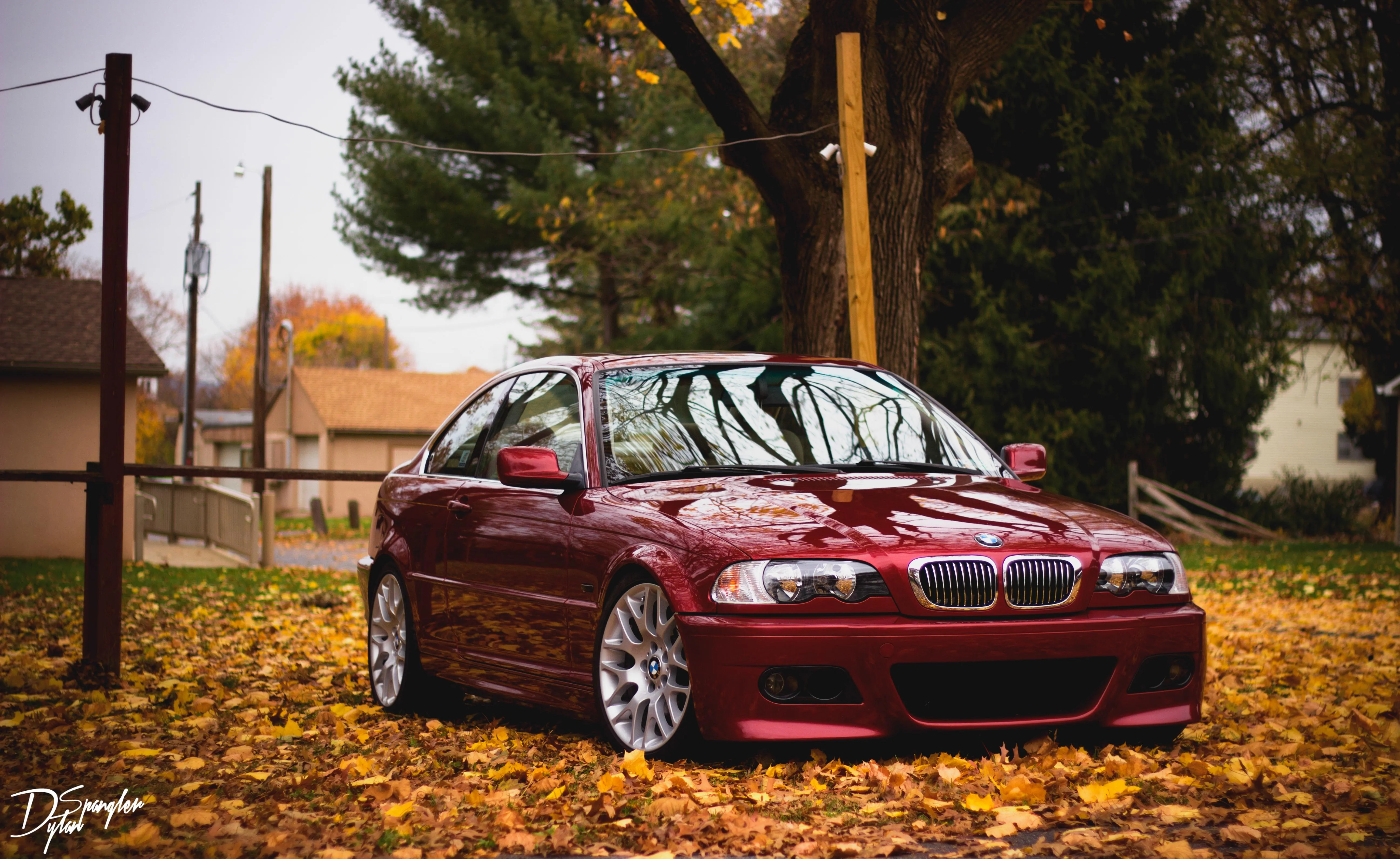 Vintage Red Car Parked in Autumn Forest Scene imagae