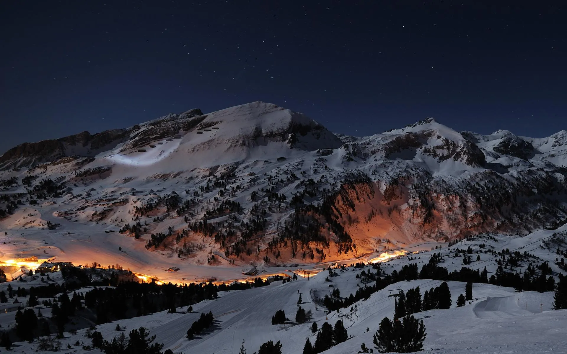 Volcanic landscape with glowing lava and clouds image