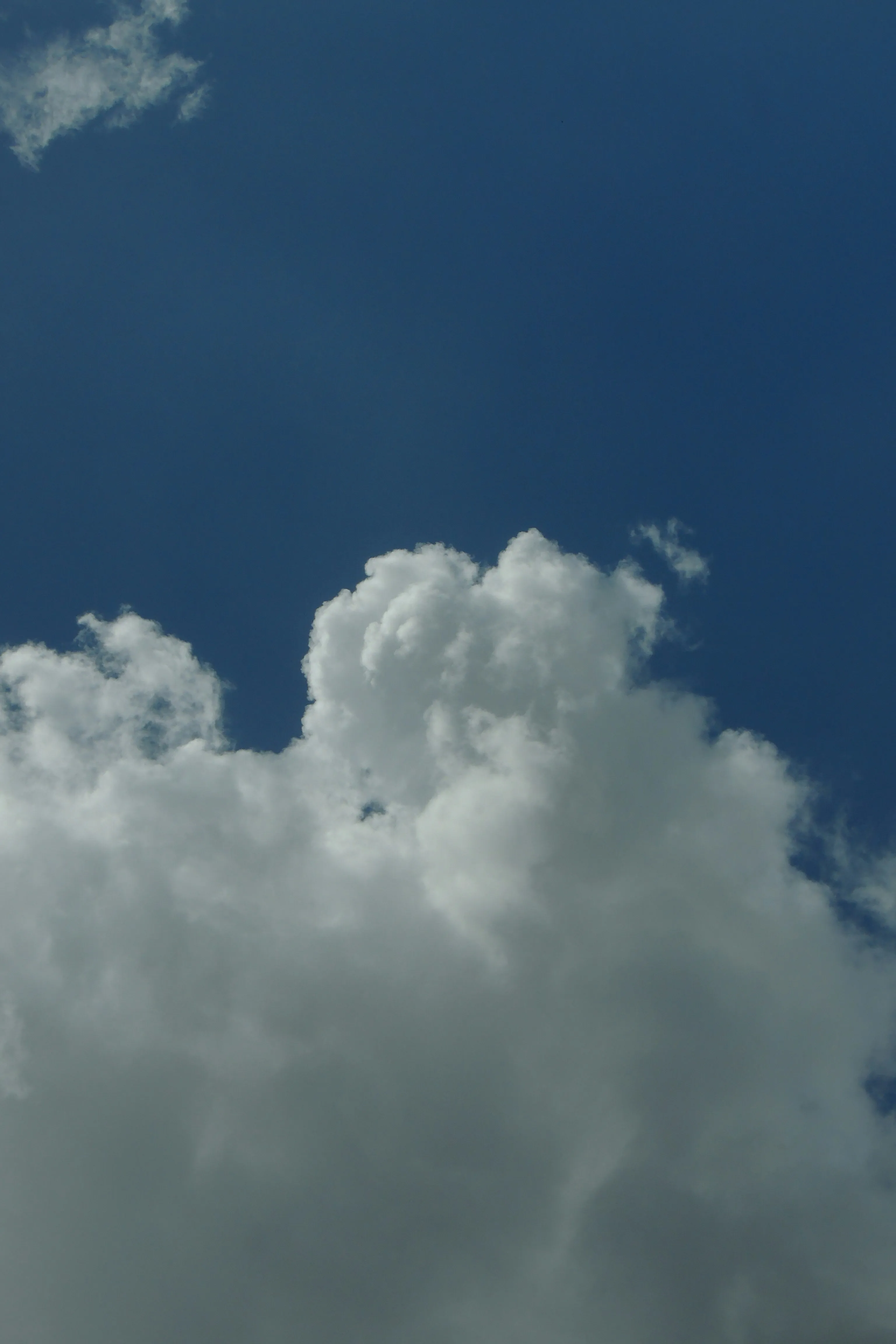 White Puffy Clouds in Clear Deep Blue Sky Free 4K Image