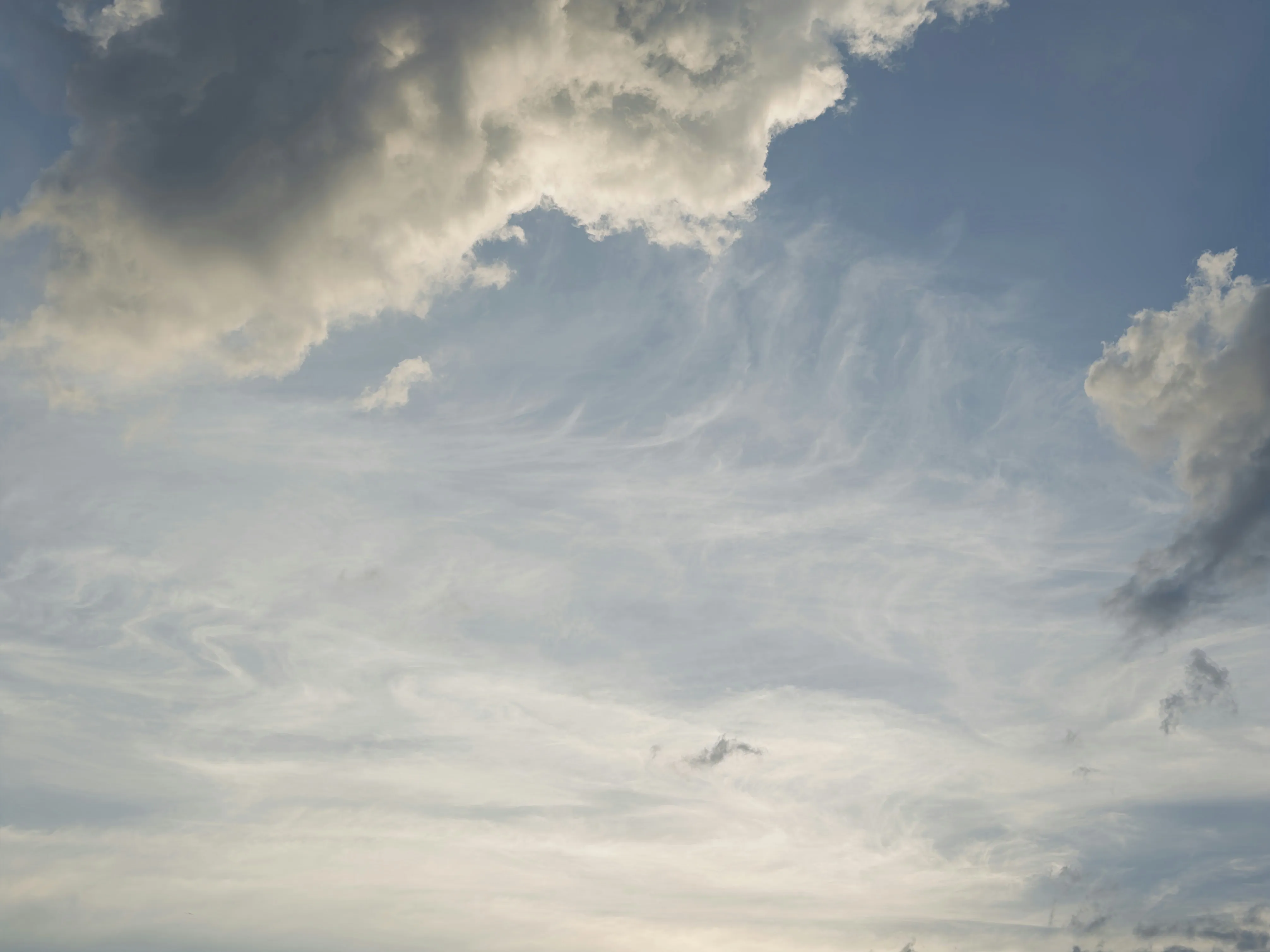 Wide Open Sky with Large Puffy Clouds and Sun Rays