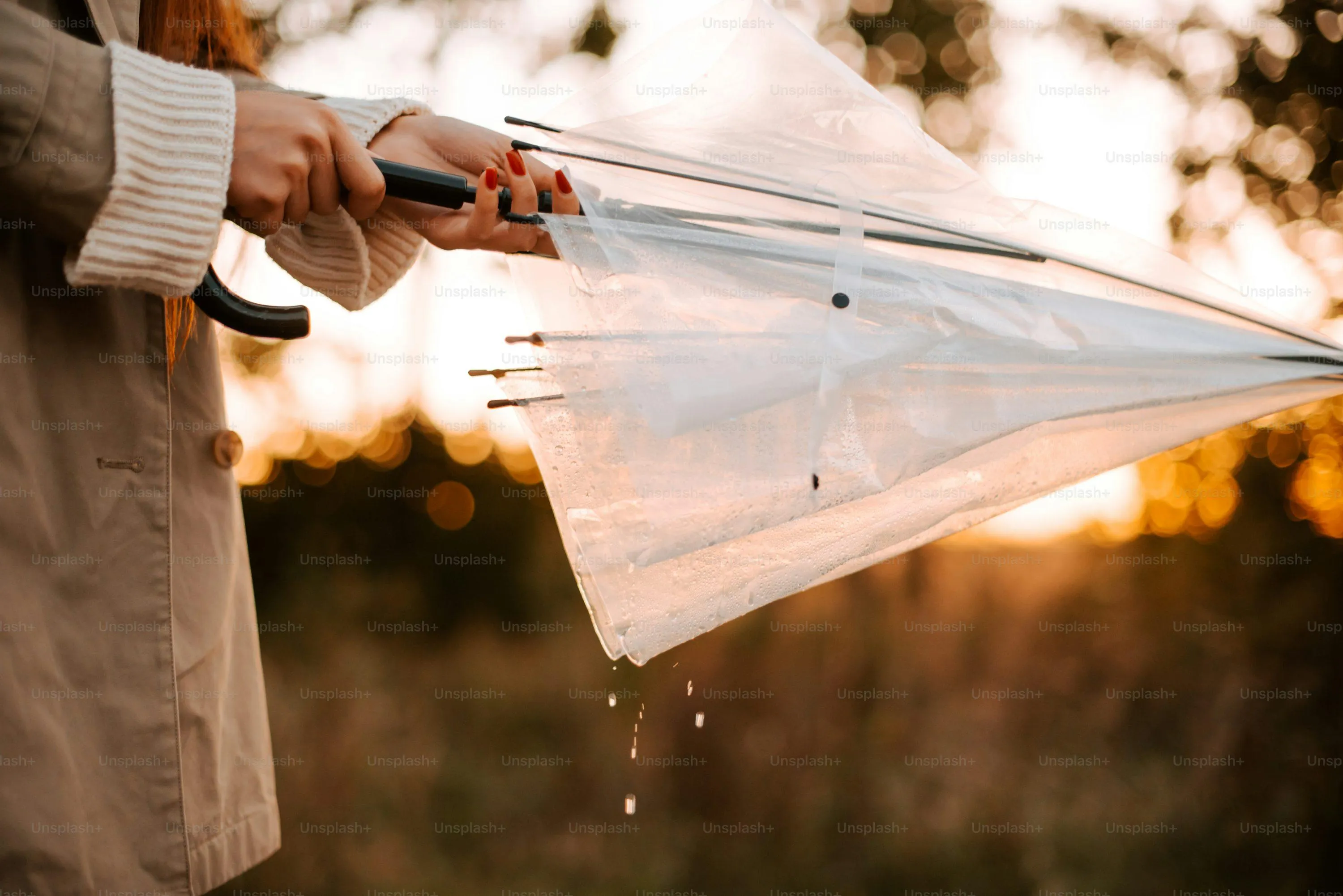 Woman Holding Transparent Umbrella in Rain Wallpaper