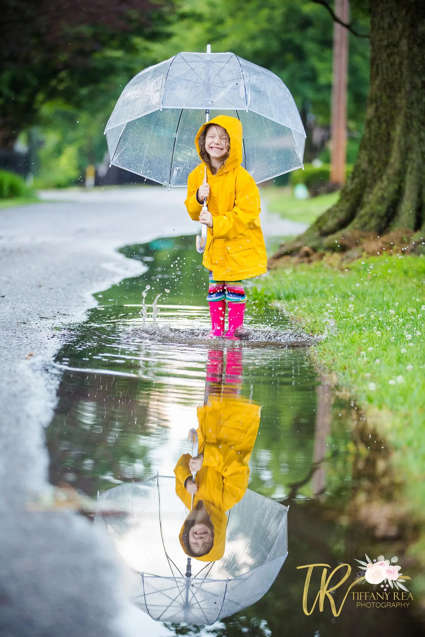 Woman in Yellow Raincoat Walking with Umbrella in Rain