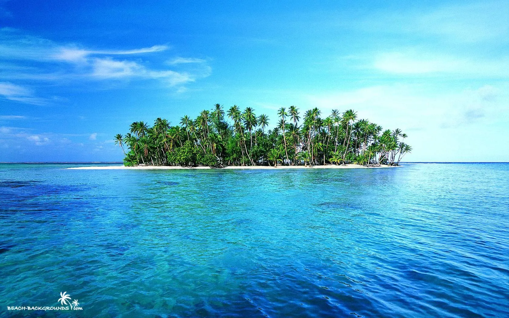Calm Blue Ocean with a Small Tropical Island in the Distance