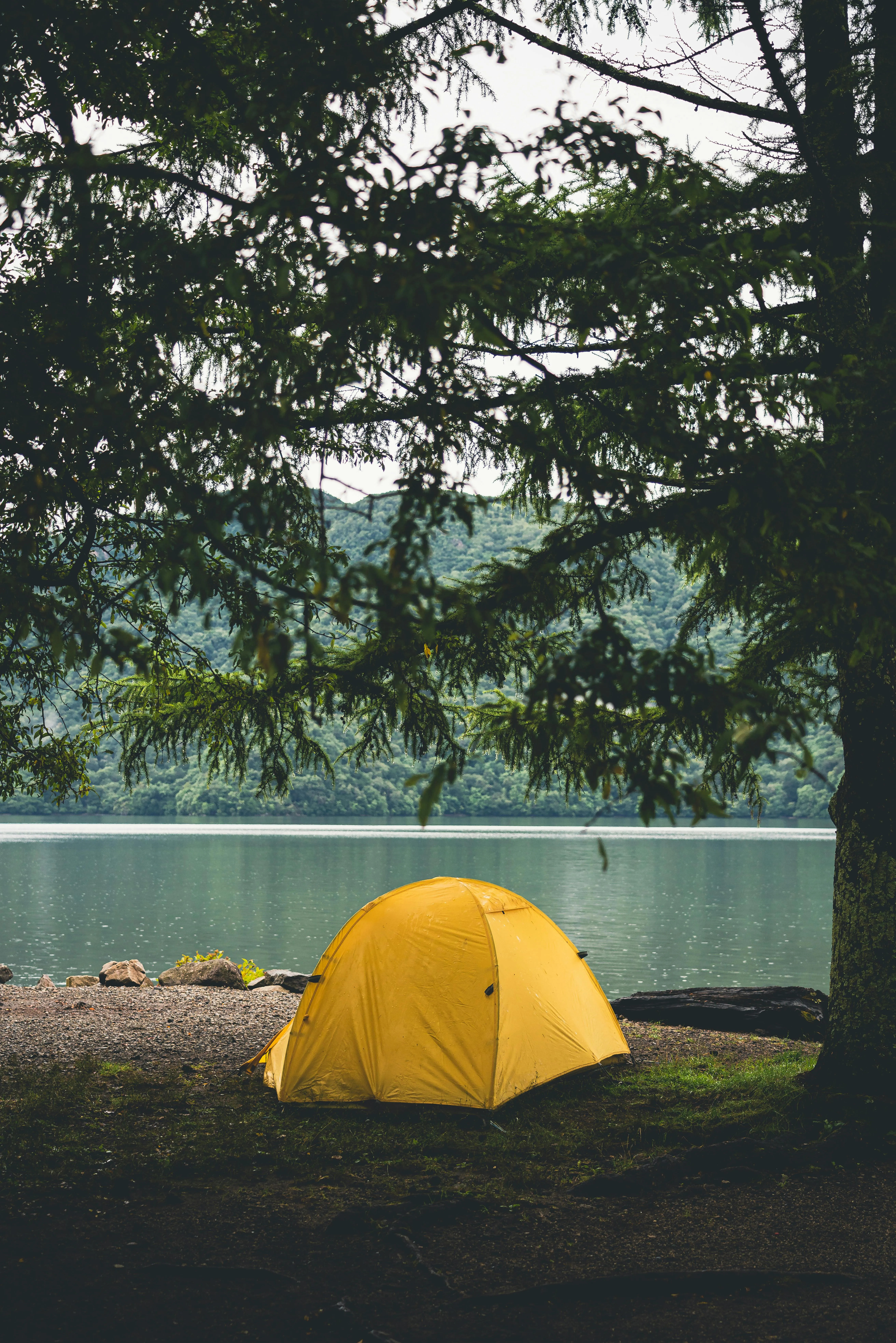 Camping Spot by the Lake with Yellow Tent HD Wallpaper