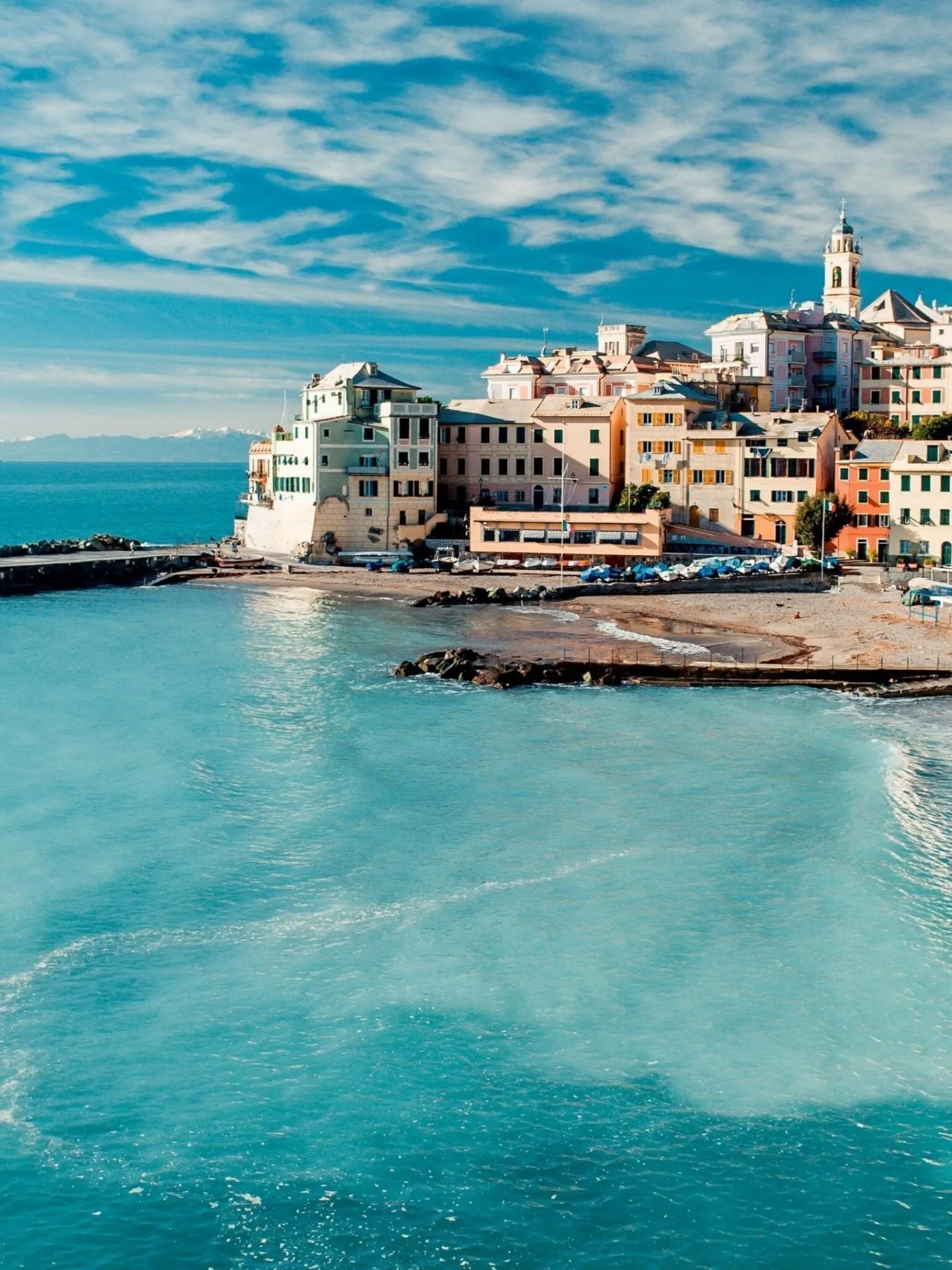 Charming Coastal Village by the Calm Ocean with a Bright Sky
