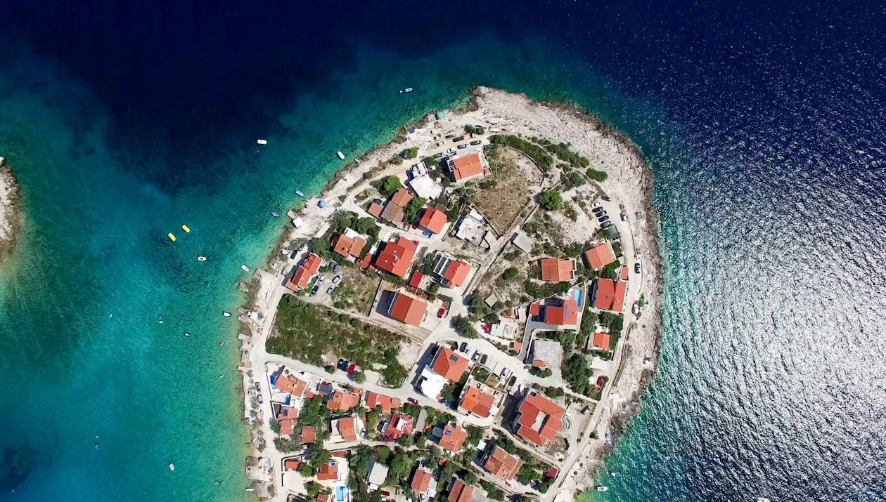 Circular Seaside Village Surrounded by Turquoise Sea
