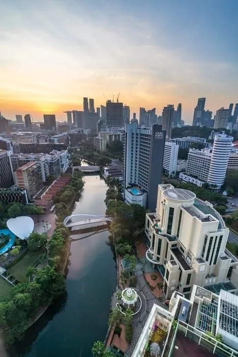 City Skyline with Winding River Aerial View wallpapers free