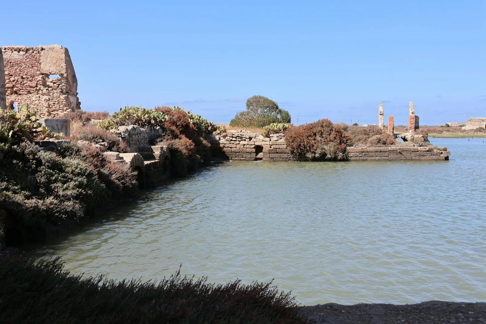 Coastal Fort View with Still Sea and Rocky Surroundings