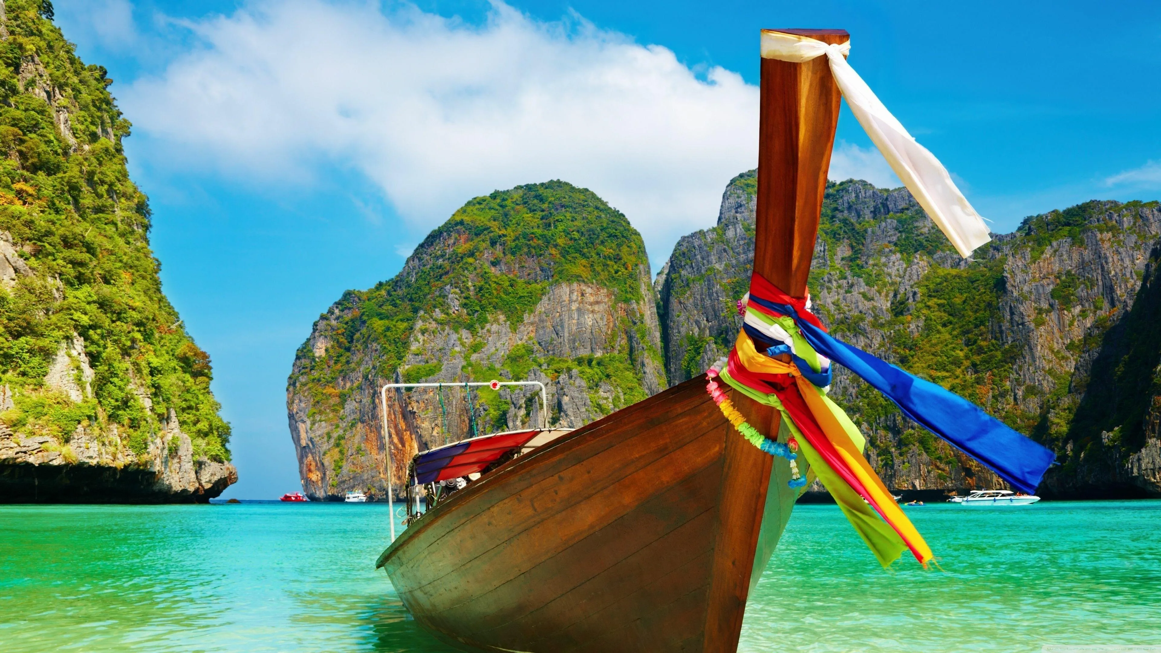 Colorful Wooden Boat Floating on Tropical Sea Water
