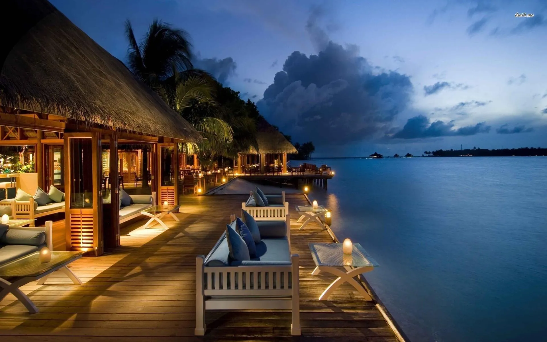 Cozy Beach Resort Light Up Beside a Peaceful Blue Sea