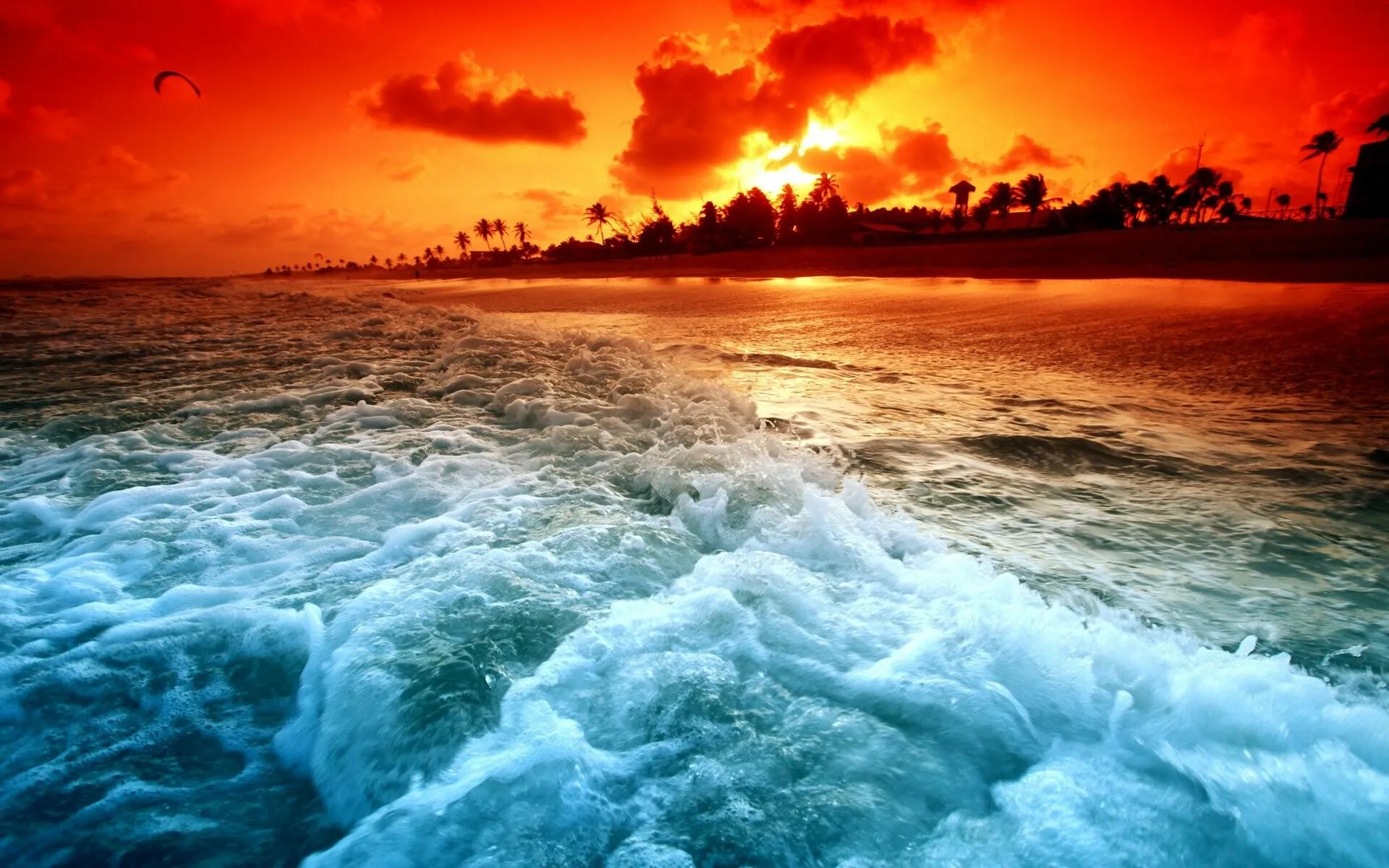 Fiery Sunset over Ocean Waves with Dramatic Sky and Light